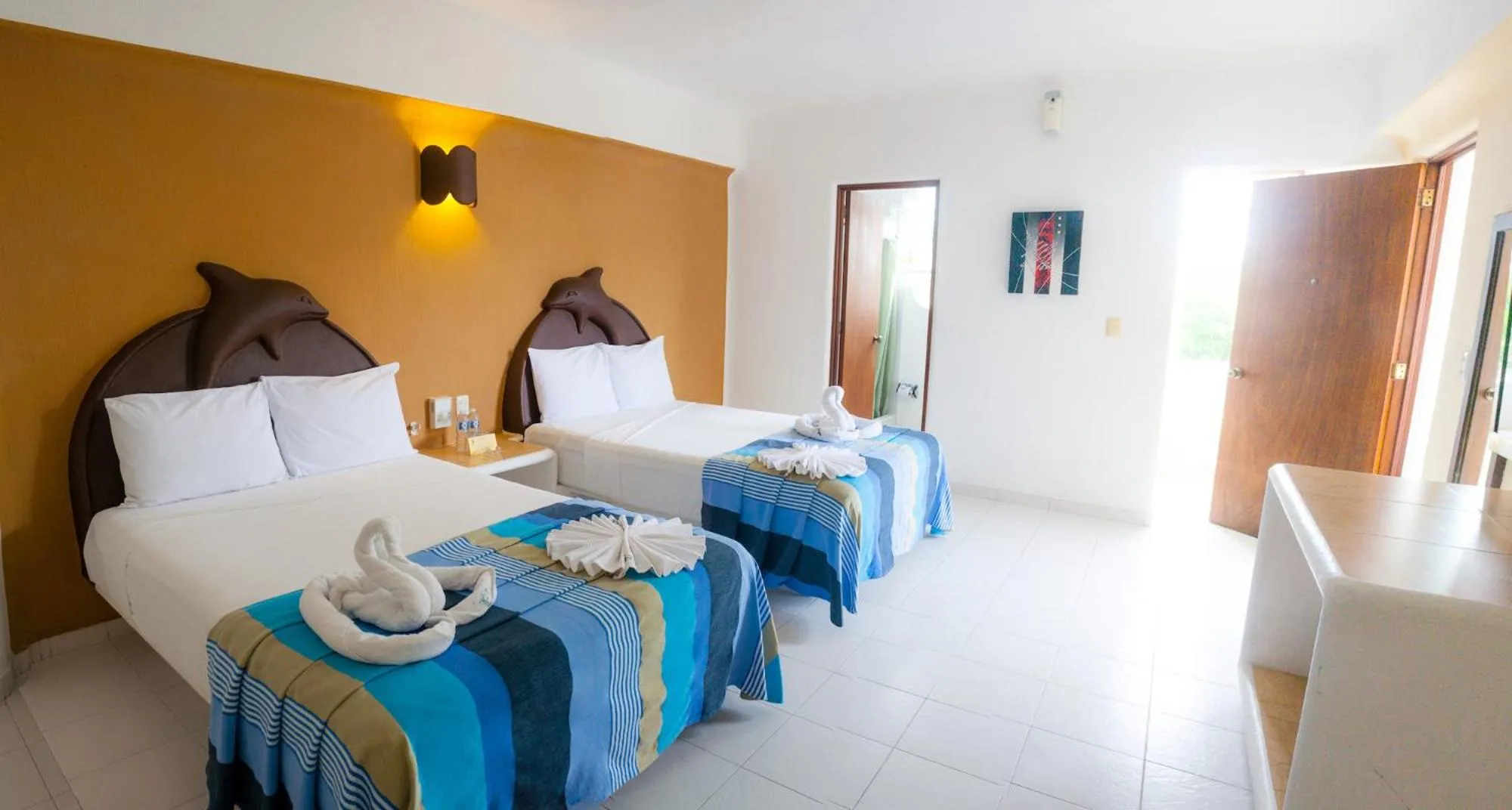 Bed in Hotel Bahia Huatulco