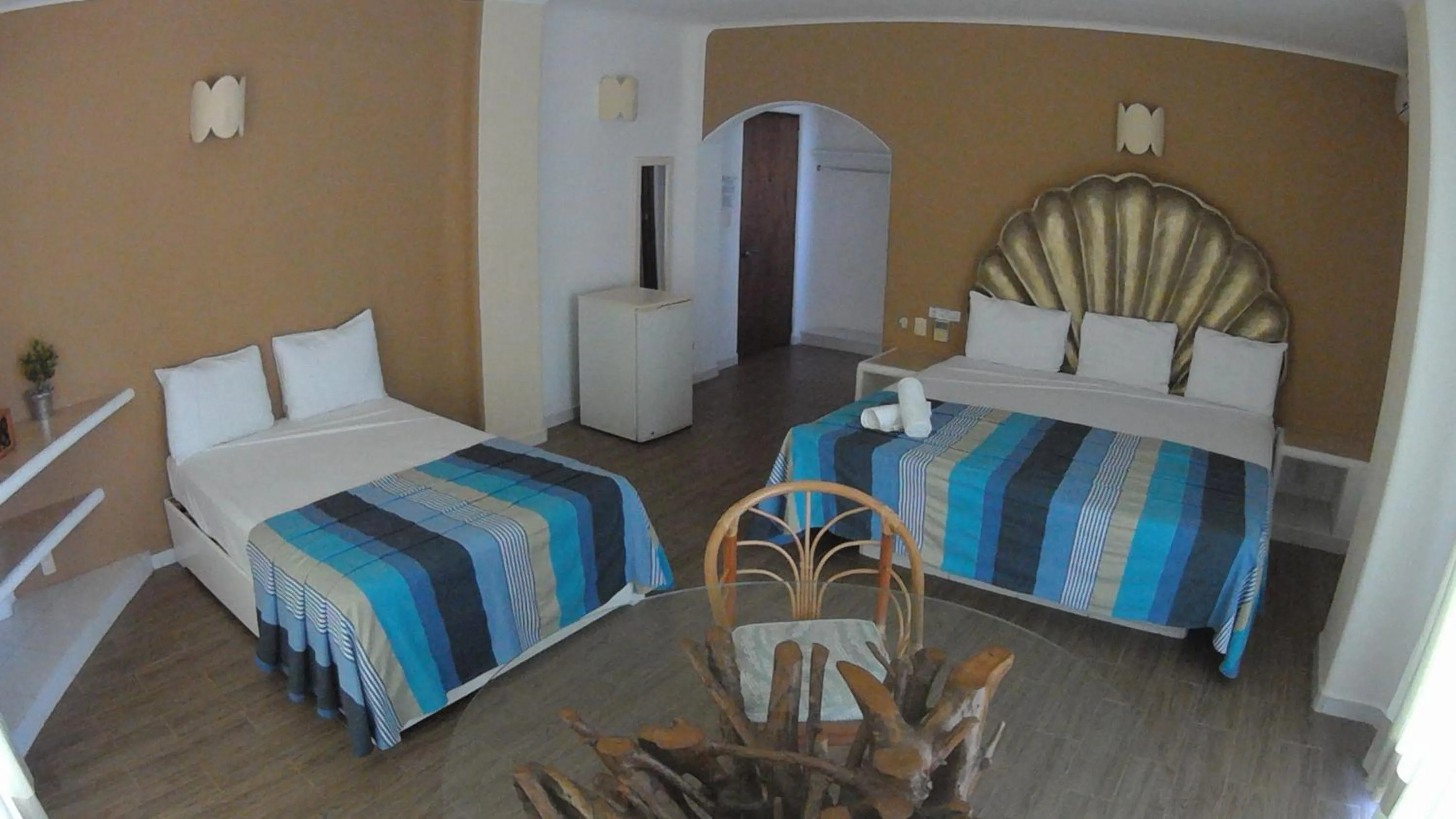 Bed in Hotel Bahia Huatulco