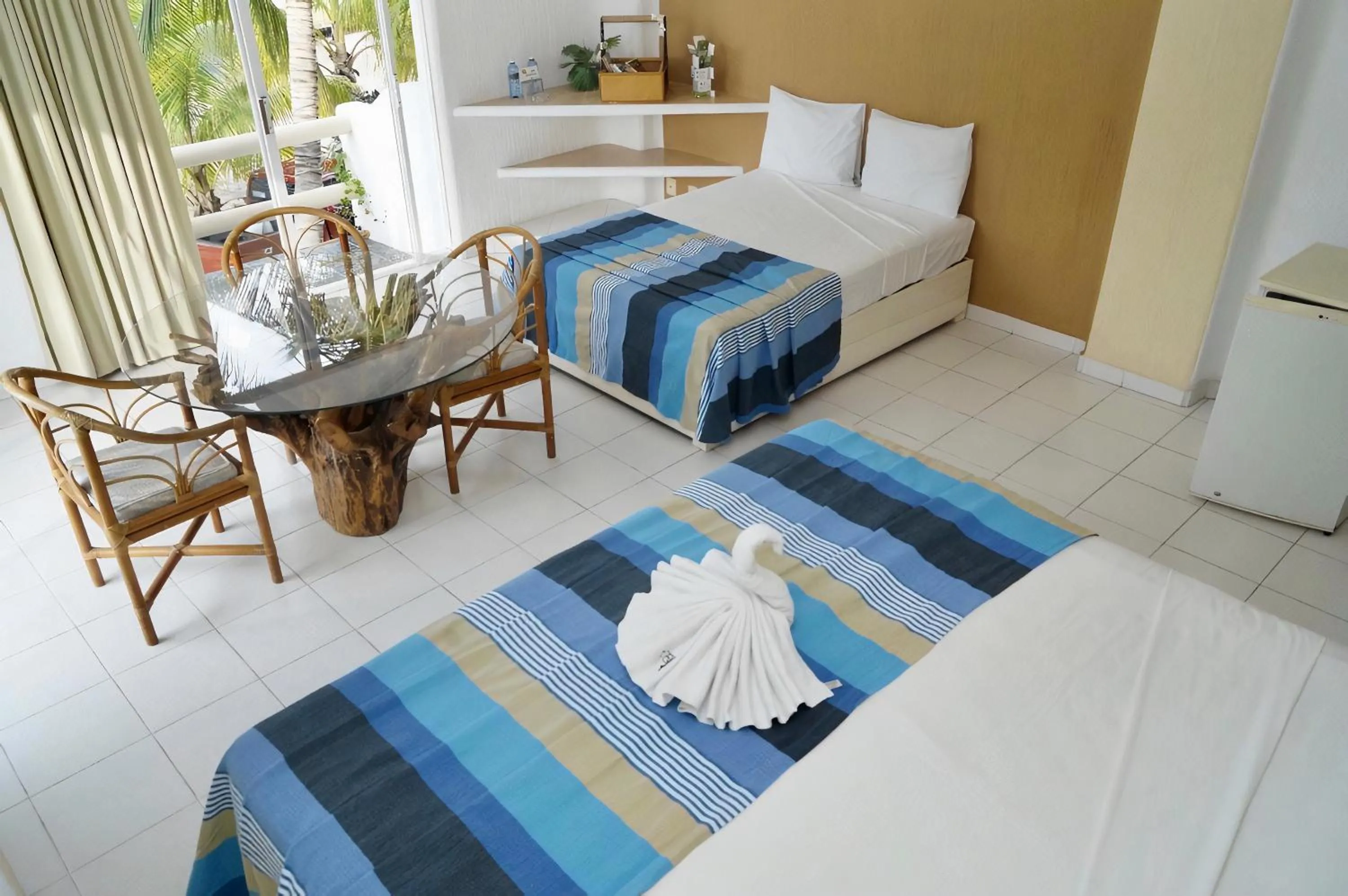 Bed in Hotel Bahia Huatulco