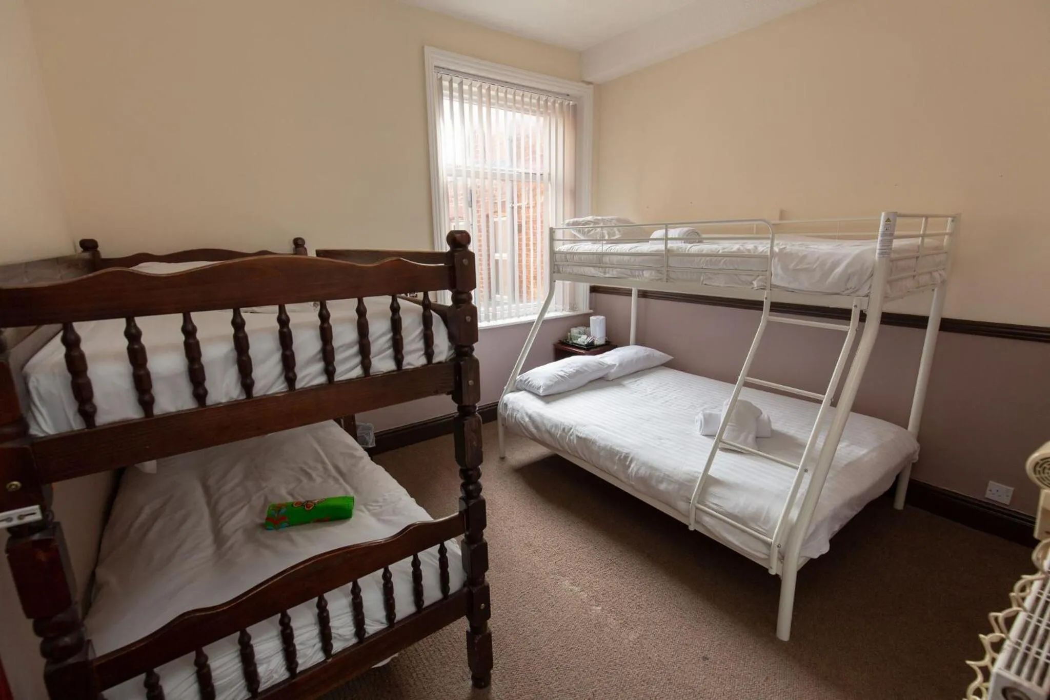 Bed in The Riviera Hotel