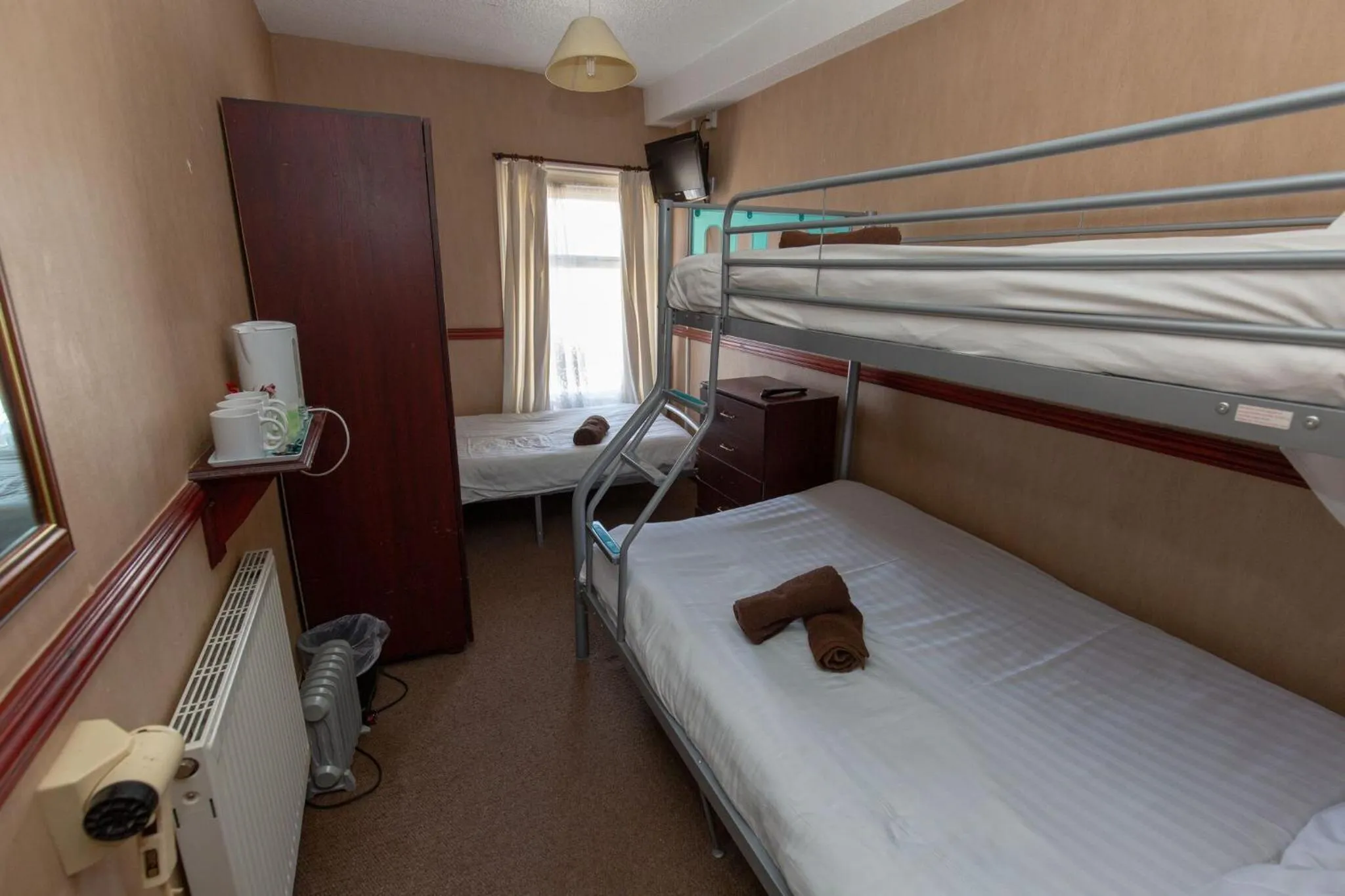 Bed in The Riviera Hotel