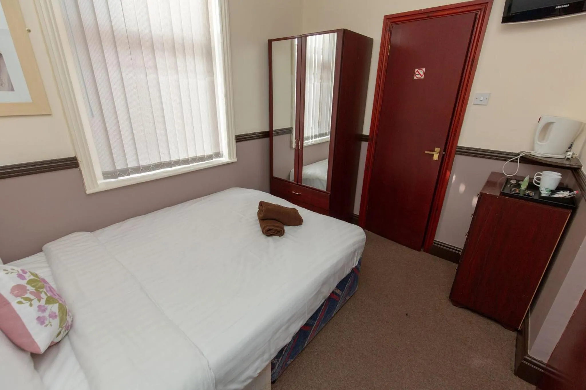 Bed in The Riviera Hotel