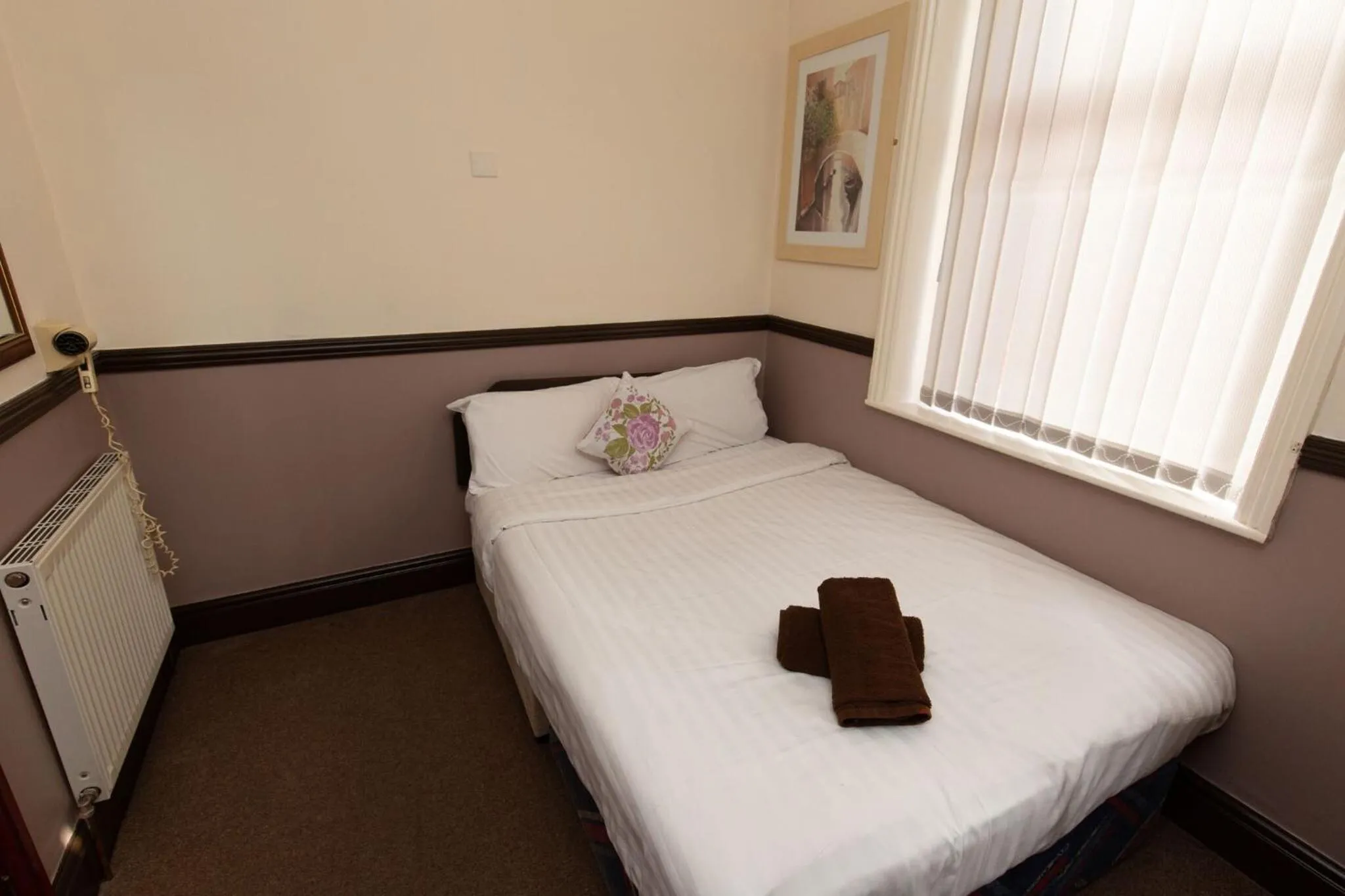 Bed in The Riviera Hotel