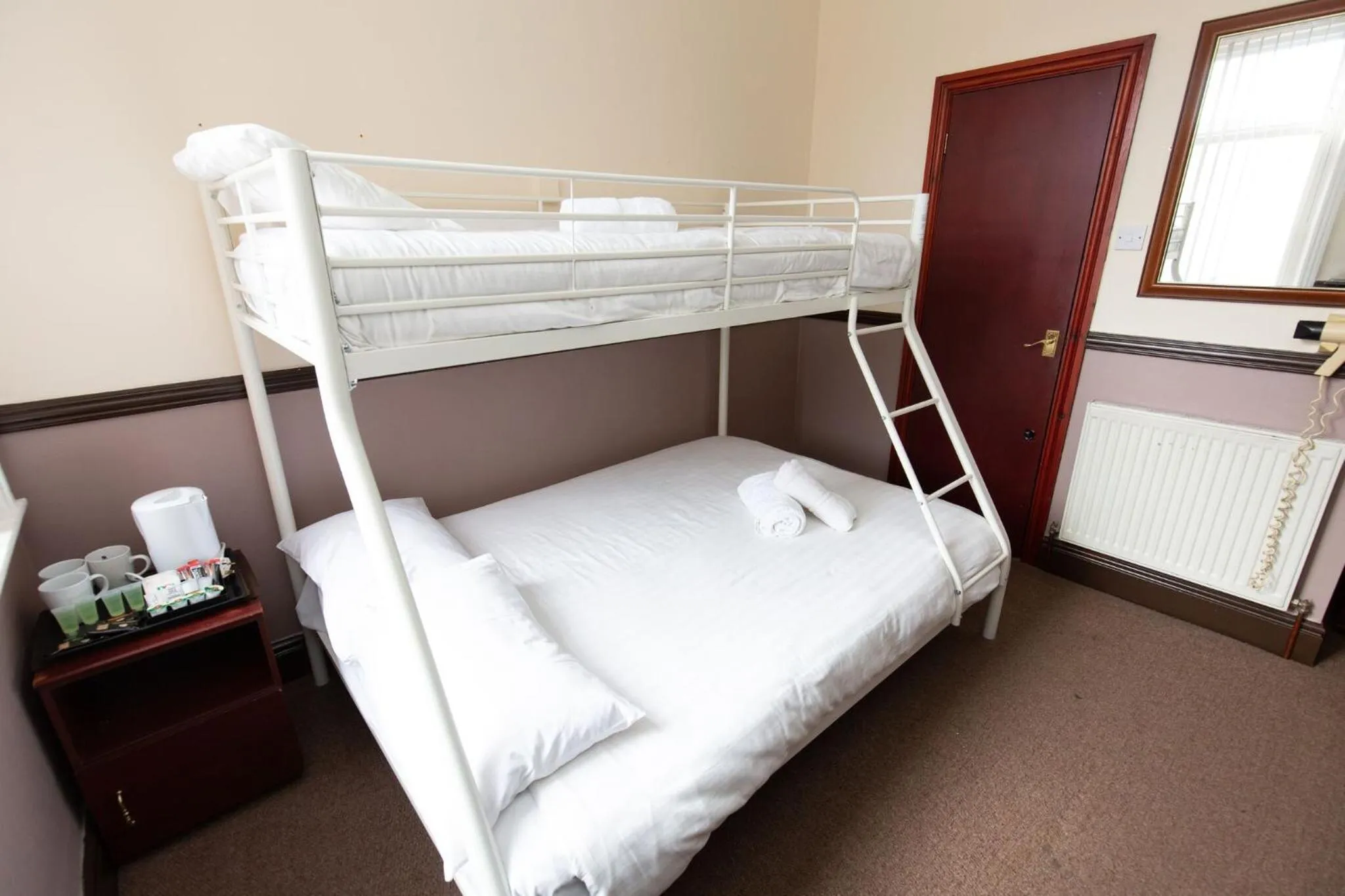 Bed in The Riviera Hotel