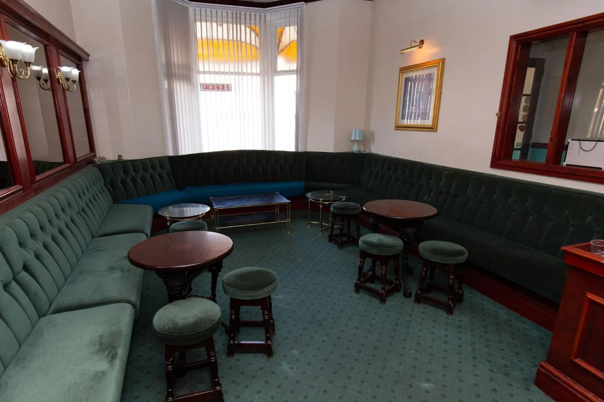 Communal lounge/ TV room in The Riviera Hotel