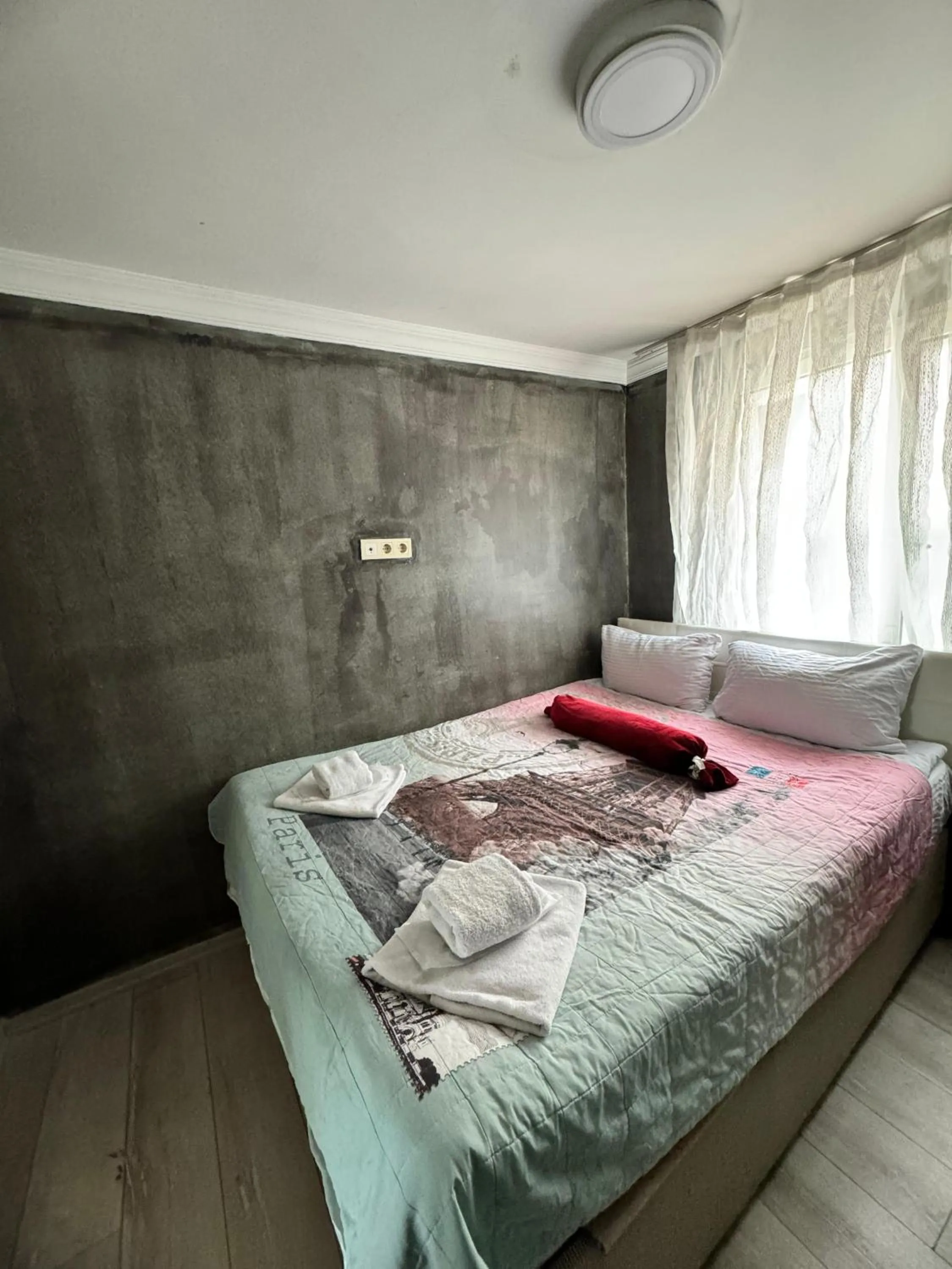 Bed in Happy Suite Boutique Hotel