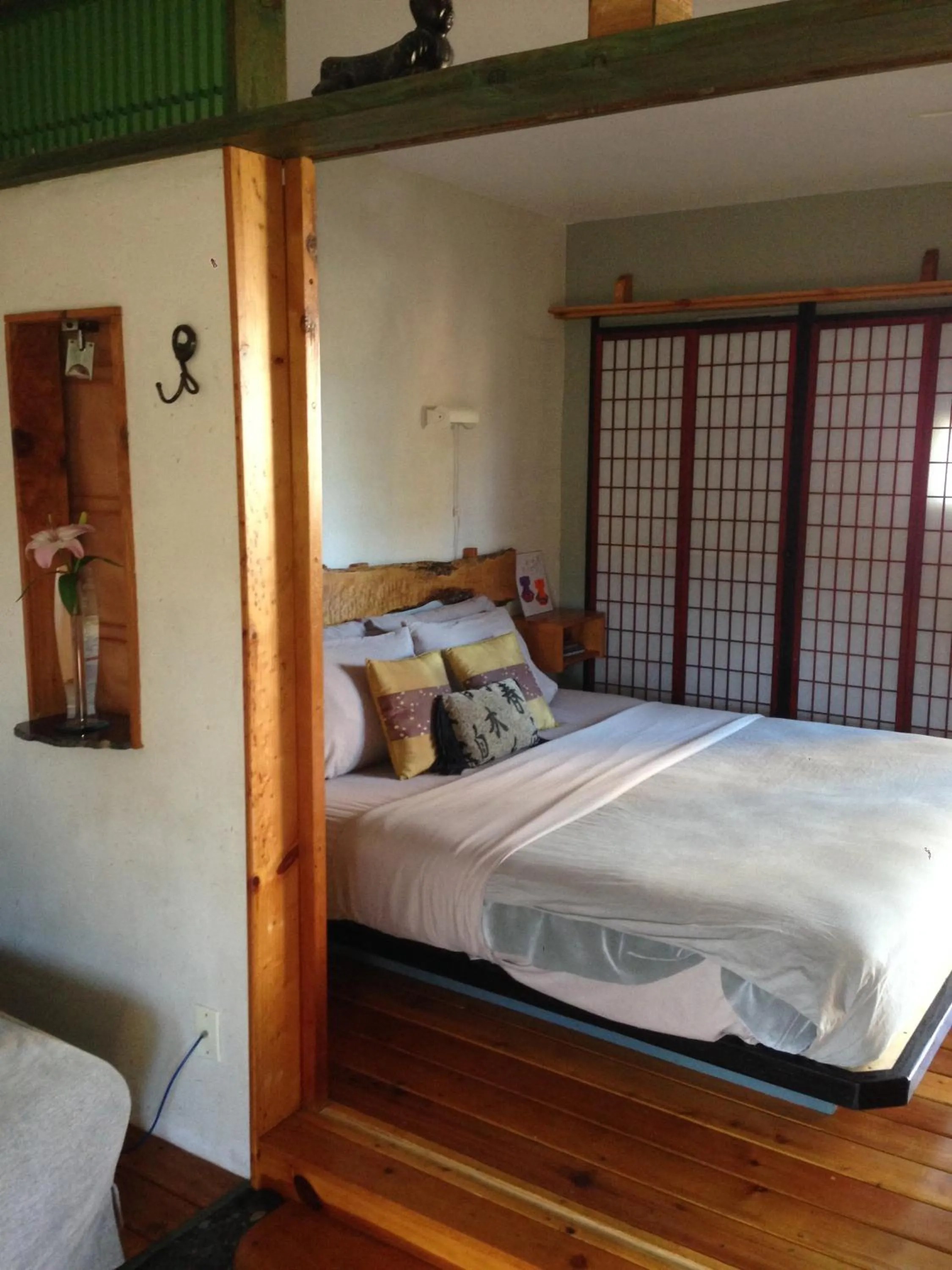 Bed in Les Artistes Inn