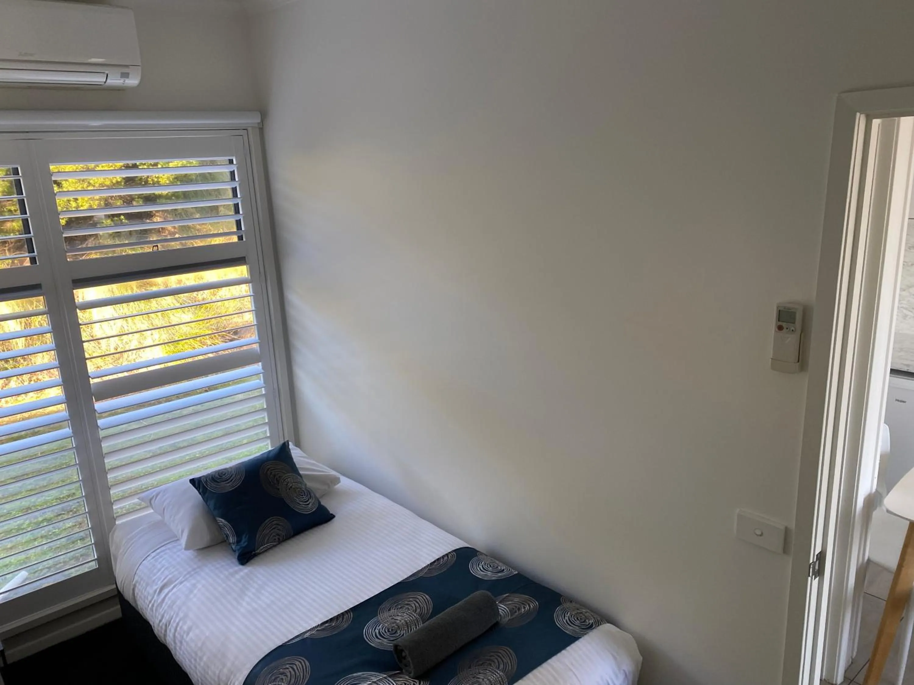 Bed in Southern Ocean Motor Inn