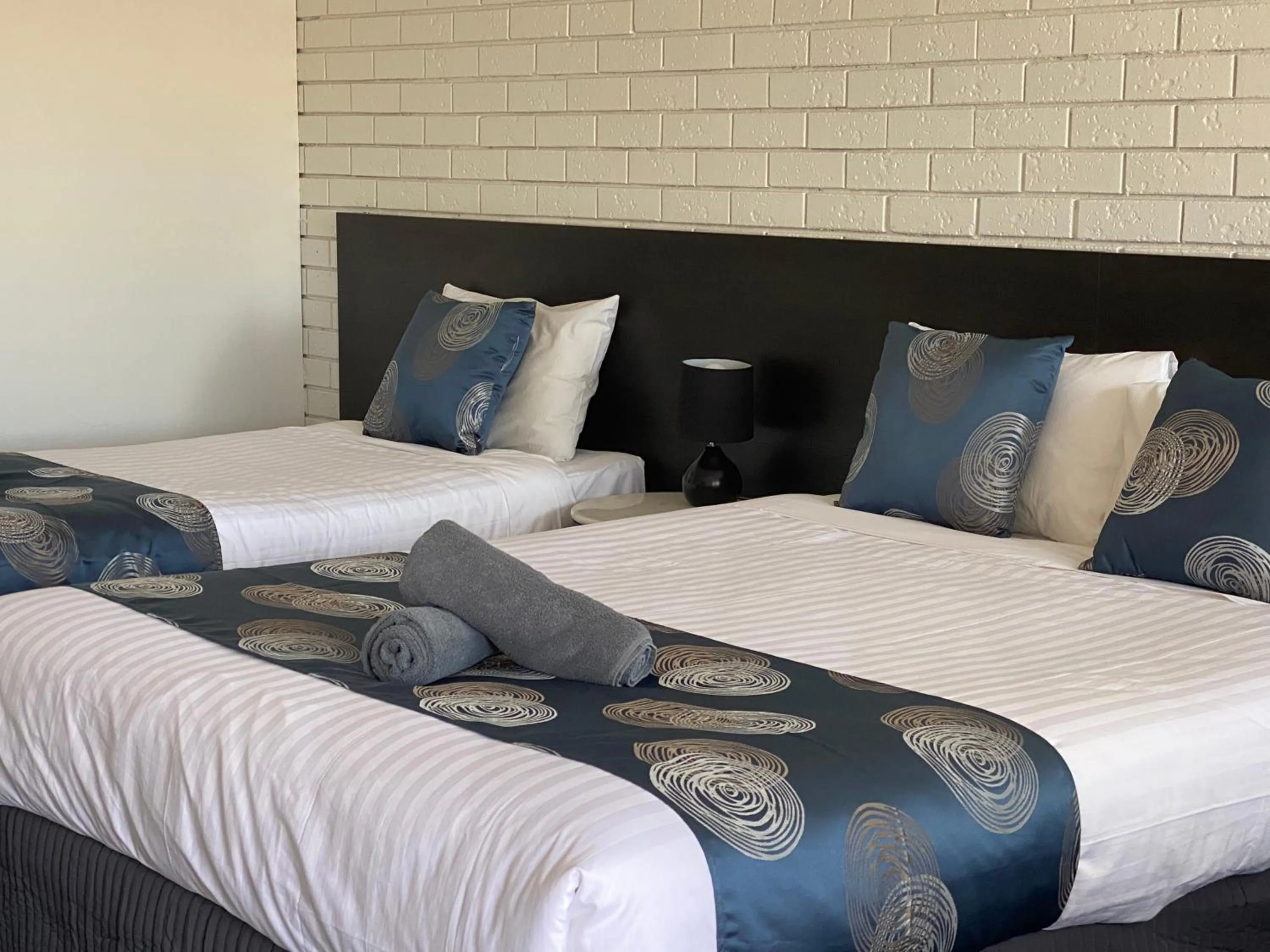 Bed in Southern Ocean Motor Inn