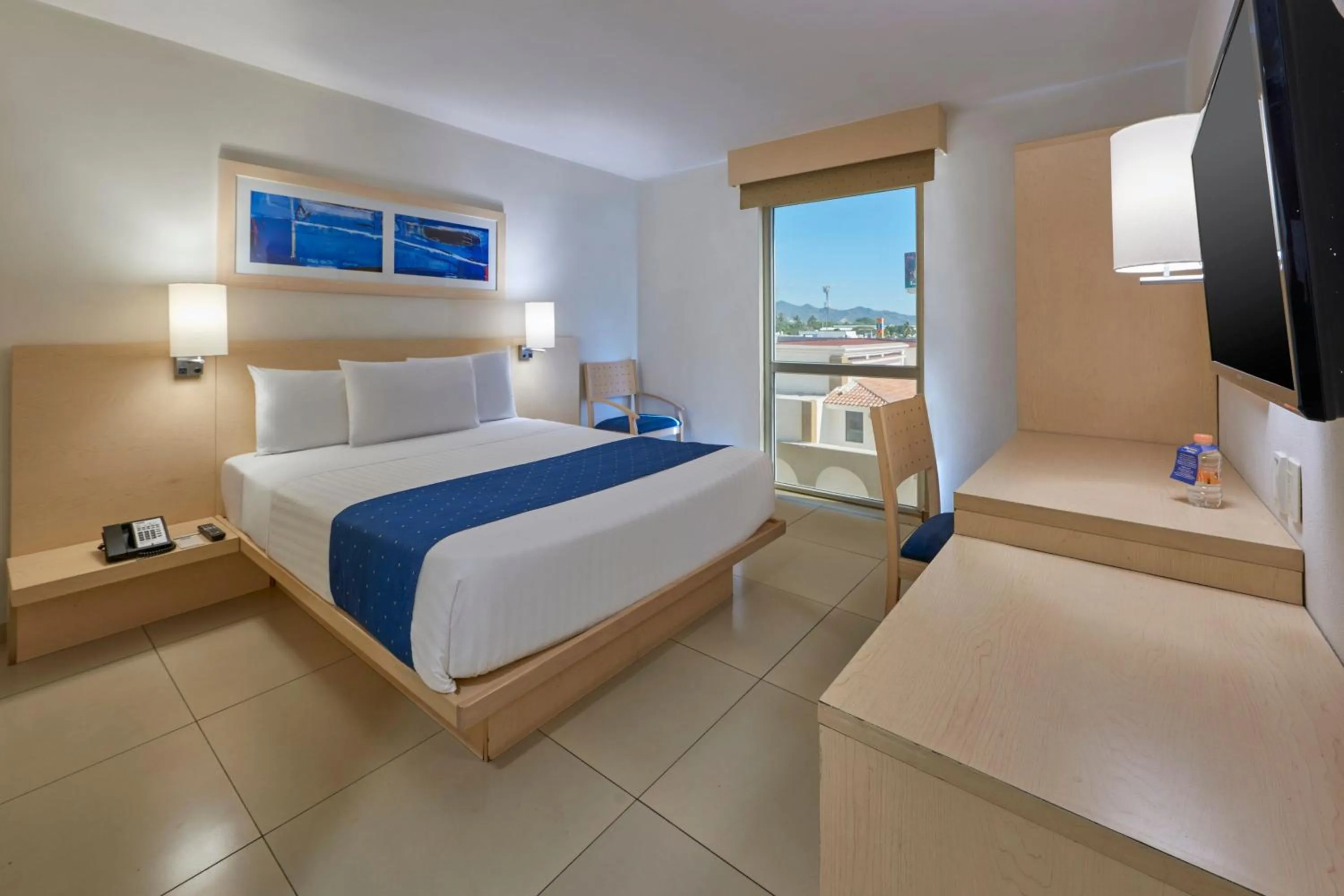 Photo of the whole room, Bed in City Express by Marriott Manzanillo