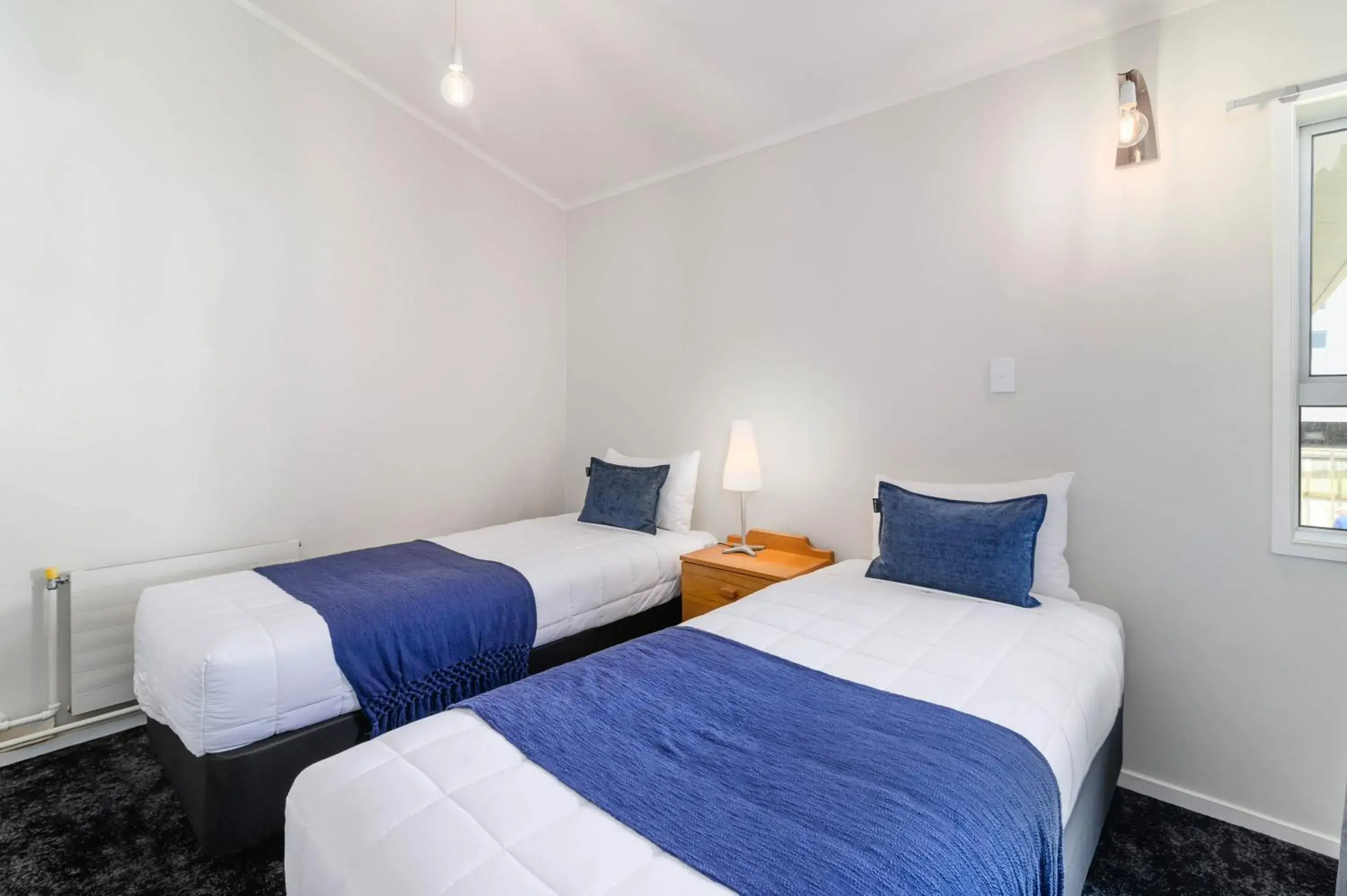 Bed in Lake Lodge Motel Rotorua