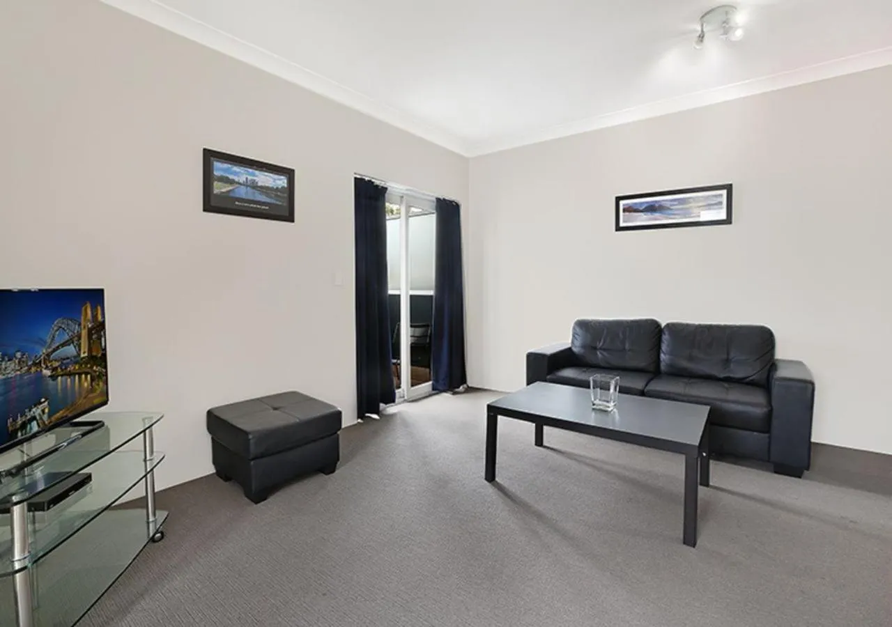 Living room in Sydney Airport Suites