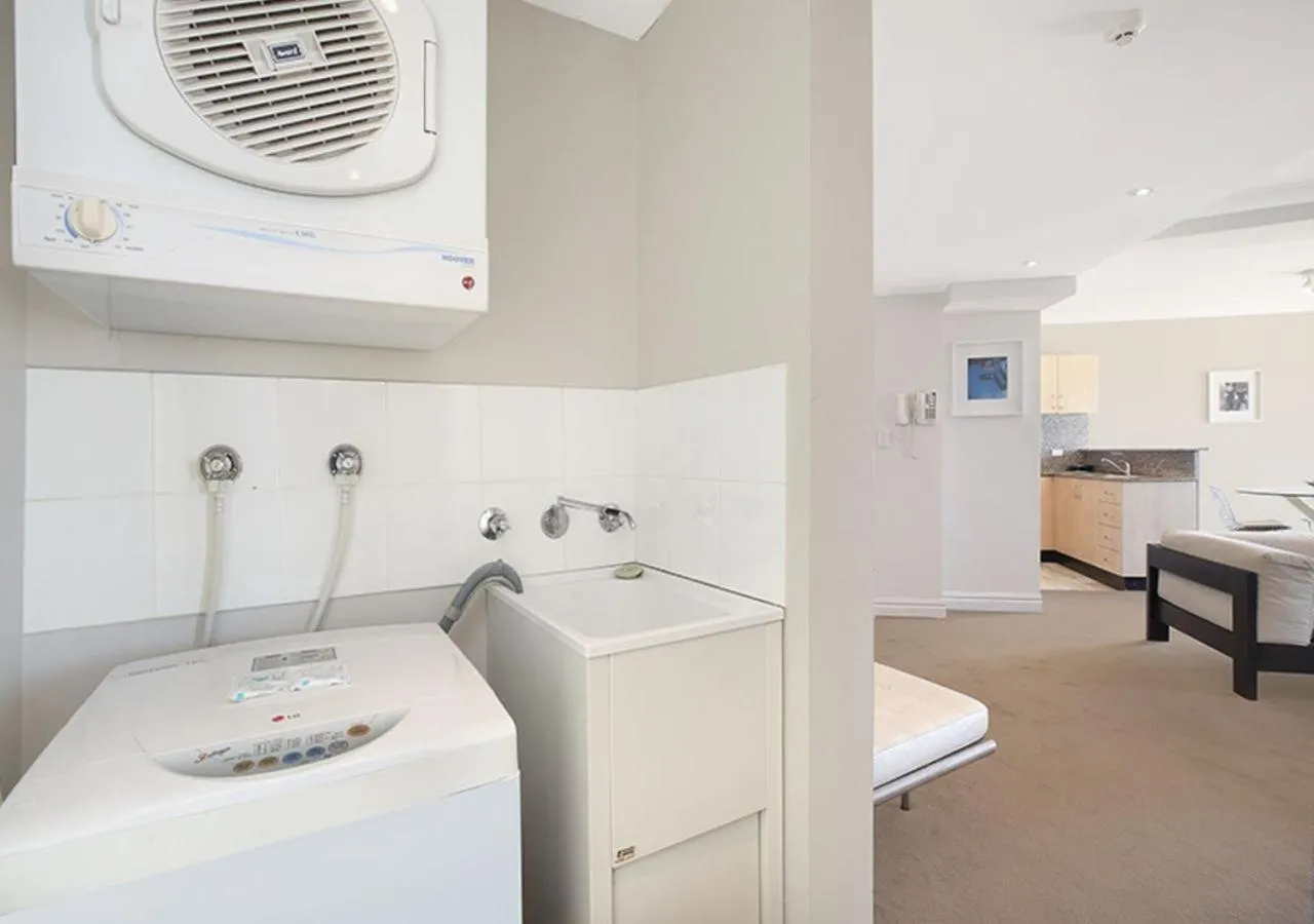washing machine in Sydney Airport Suites