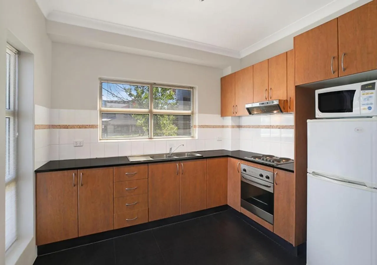 Kitchen or kitchenette in Sydney Airport Suites