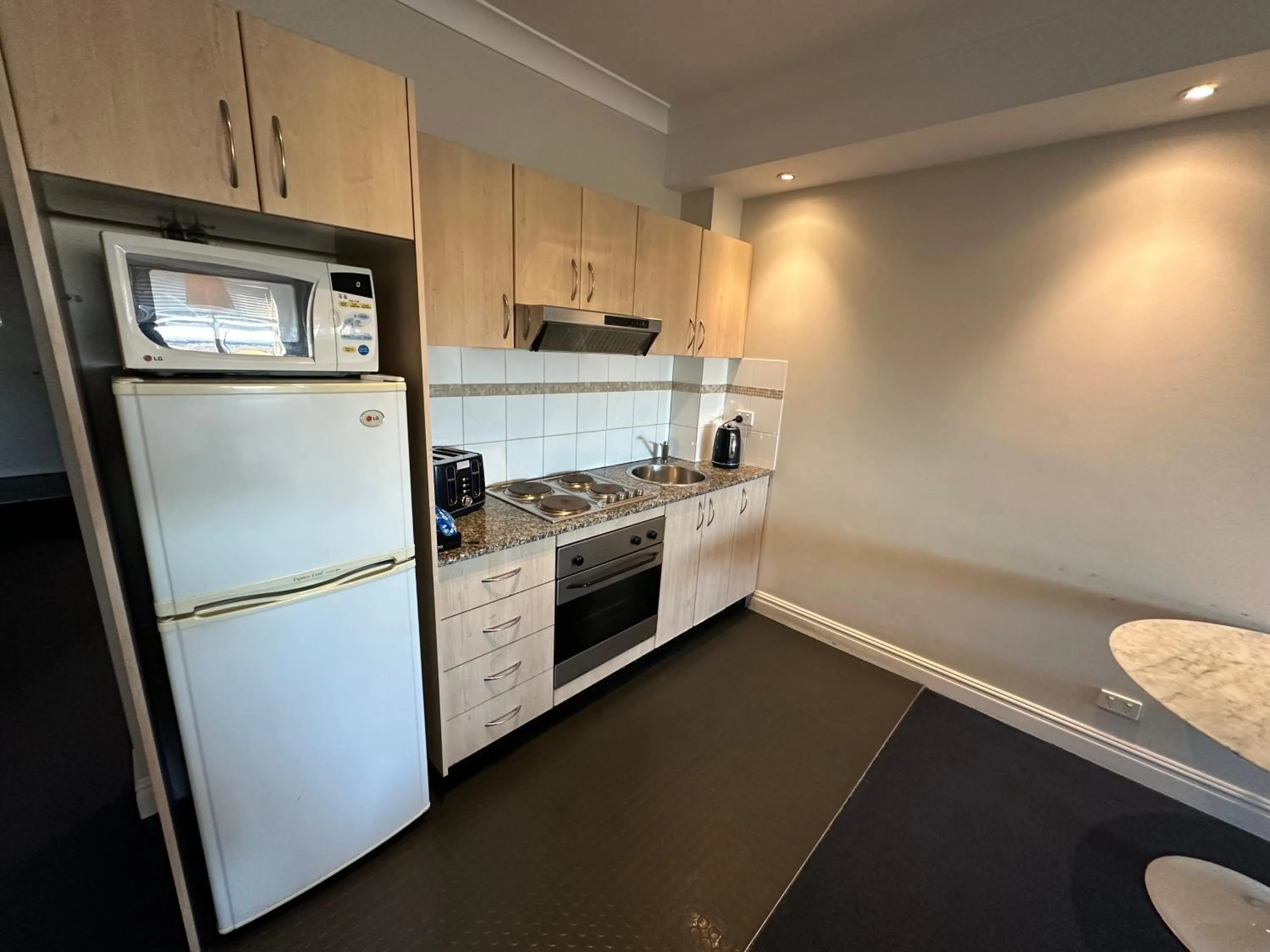 Kitchen or kitchenette in Sydney Airport Suites