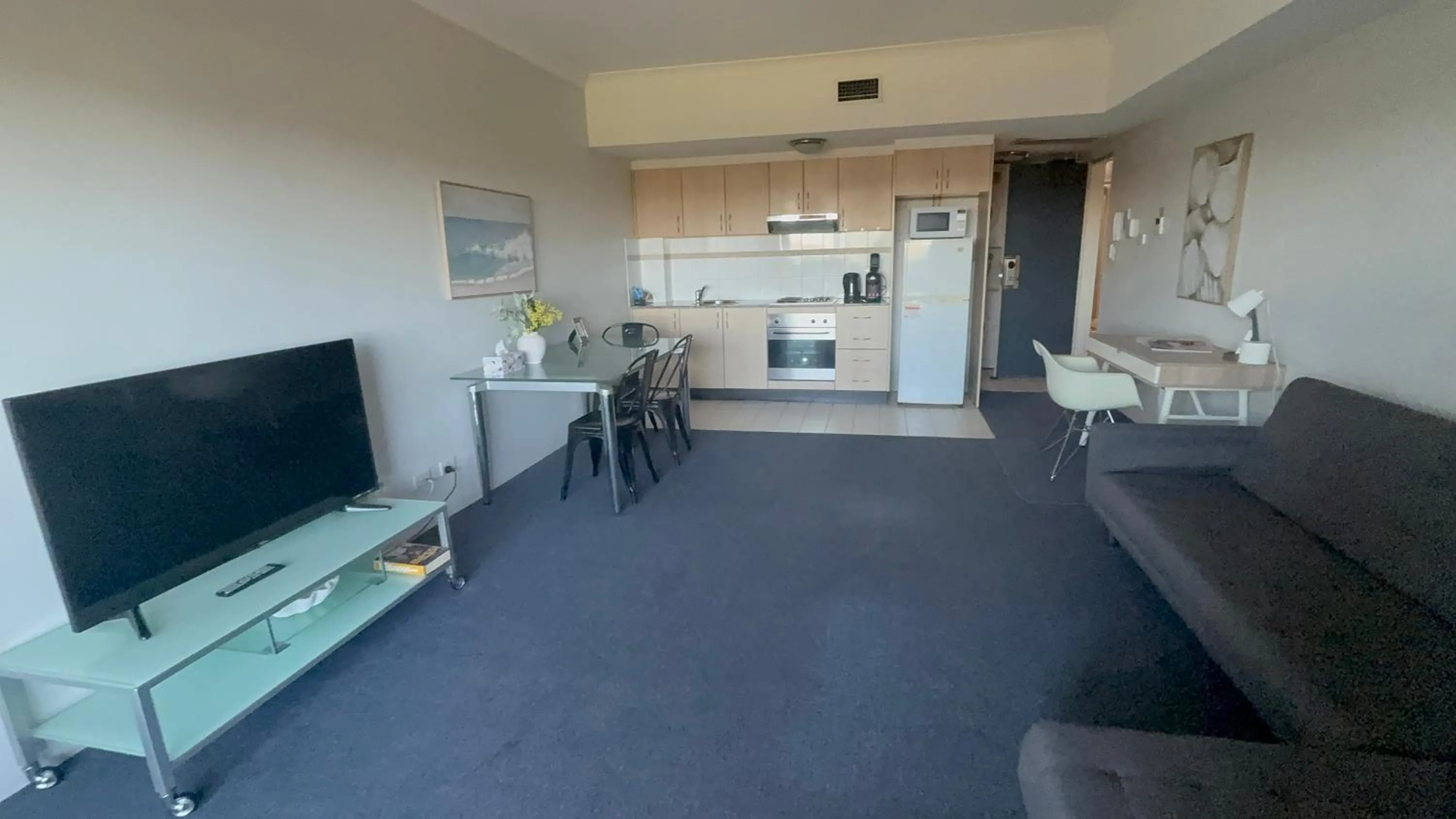 Living room in Sydney Airport Suites