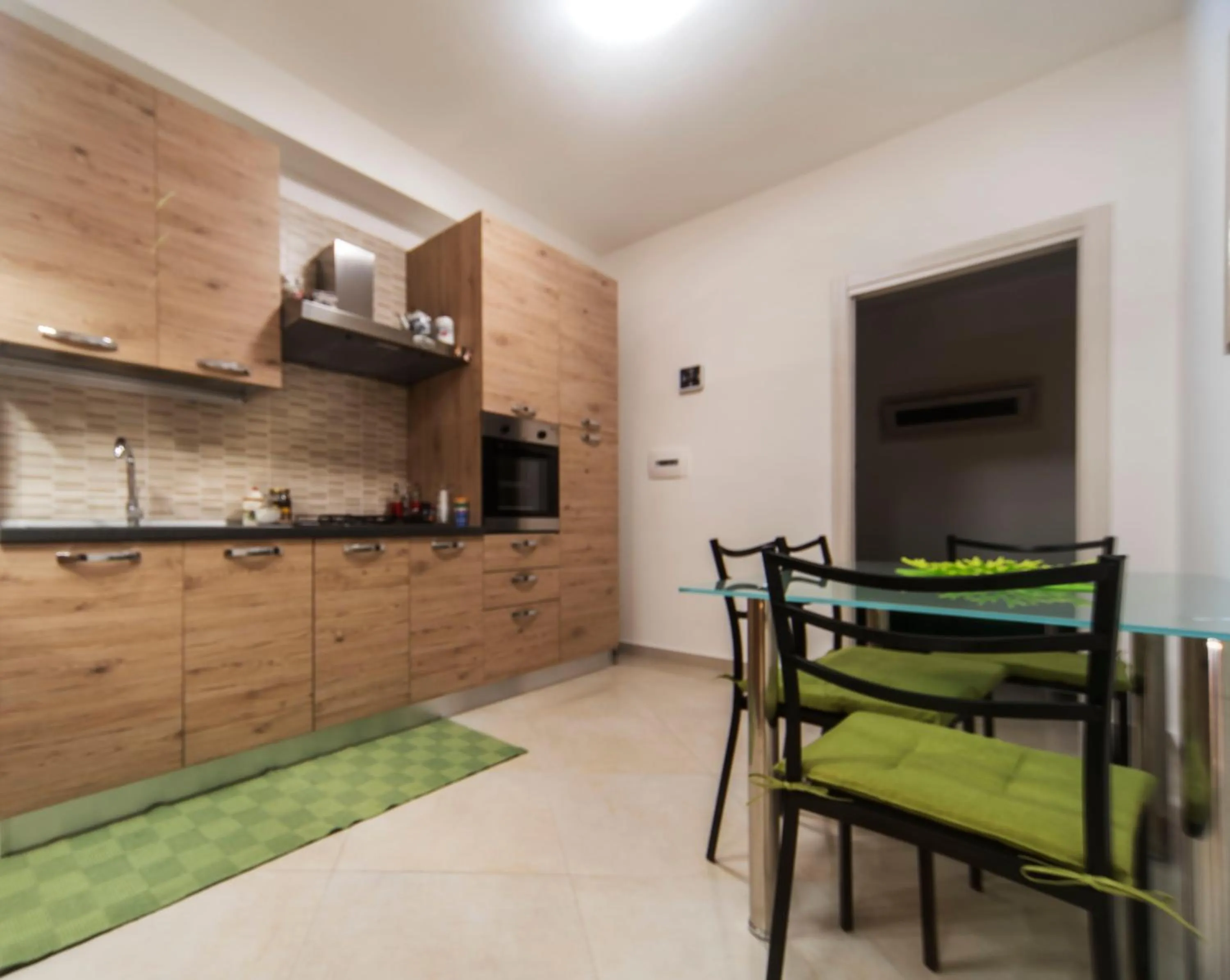 Kitchen or kitchenette in Casa Vacanza AcquaMarina