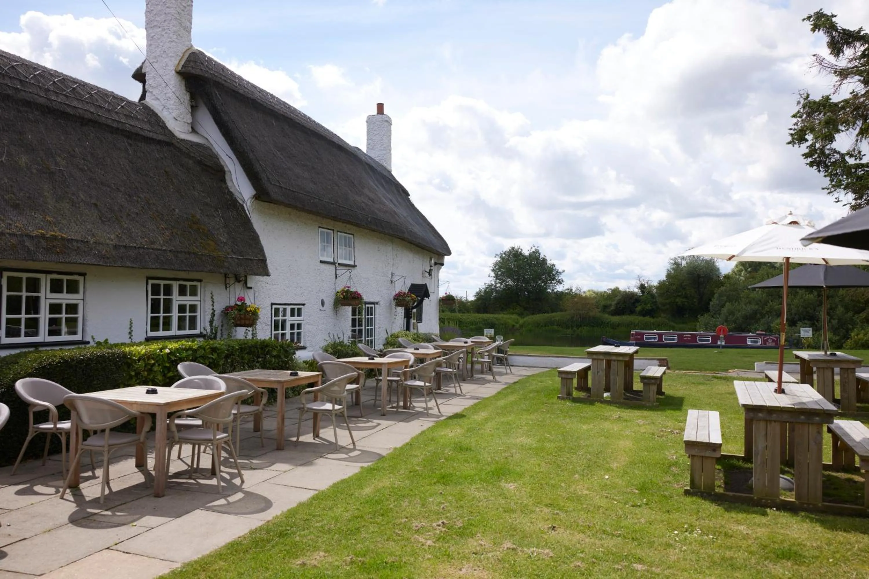 Garden in Old Ferry Boat by Greene King Inns