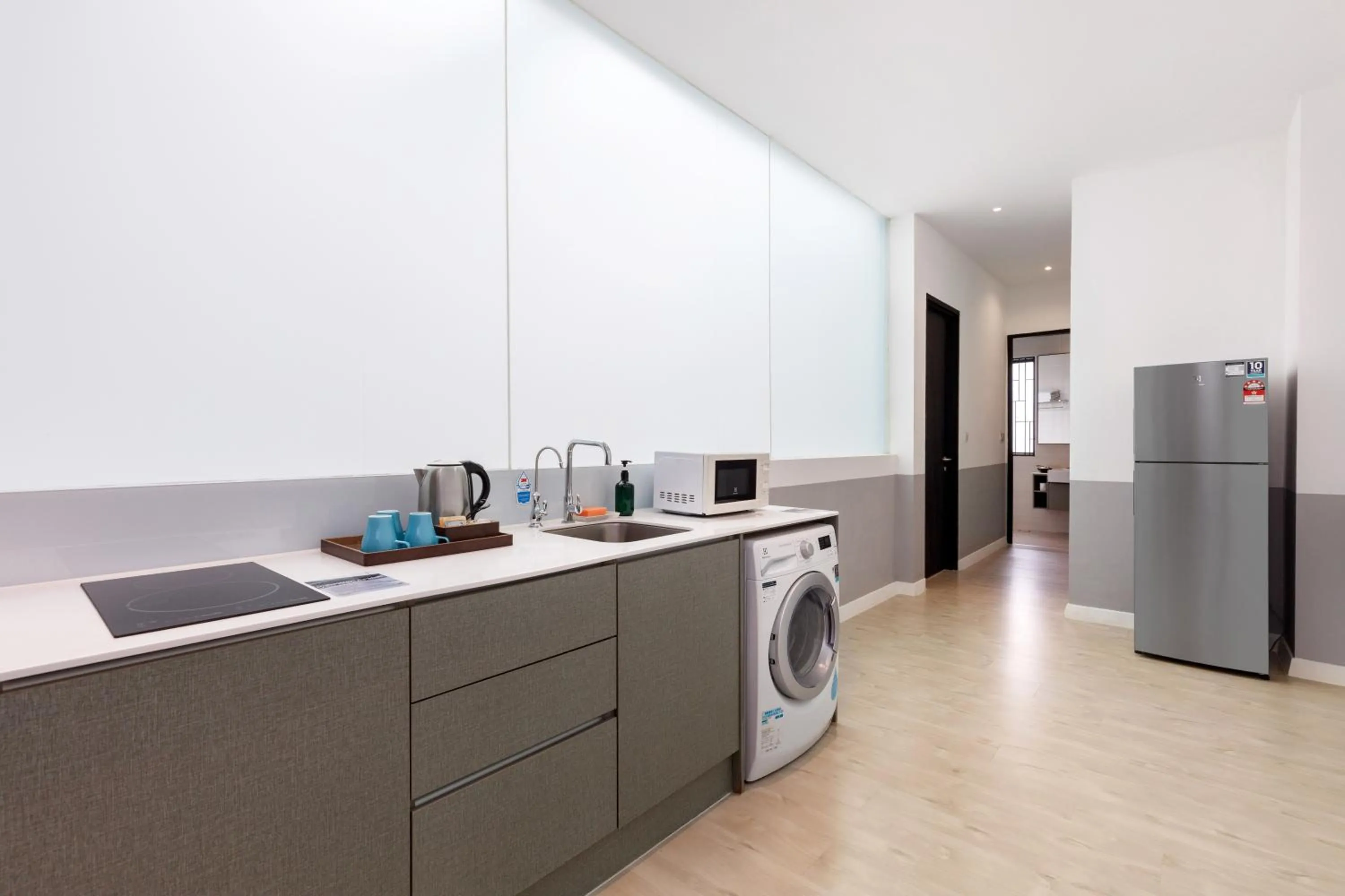 Kitchen or kitchenette in Hutton Suite Hotel Managed by The Ascott Limited