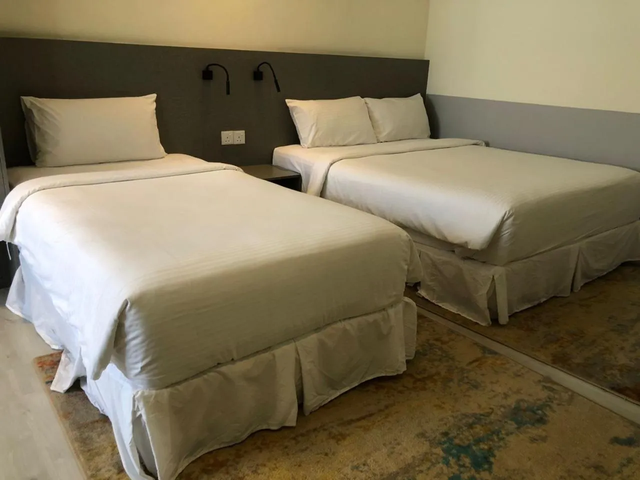 Bed in Hutton Suite Hotel Managed by The Ascott Limited