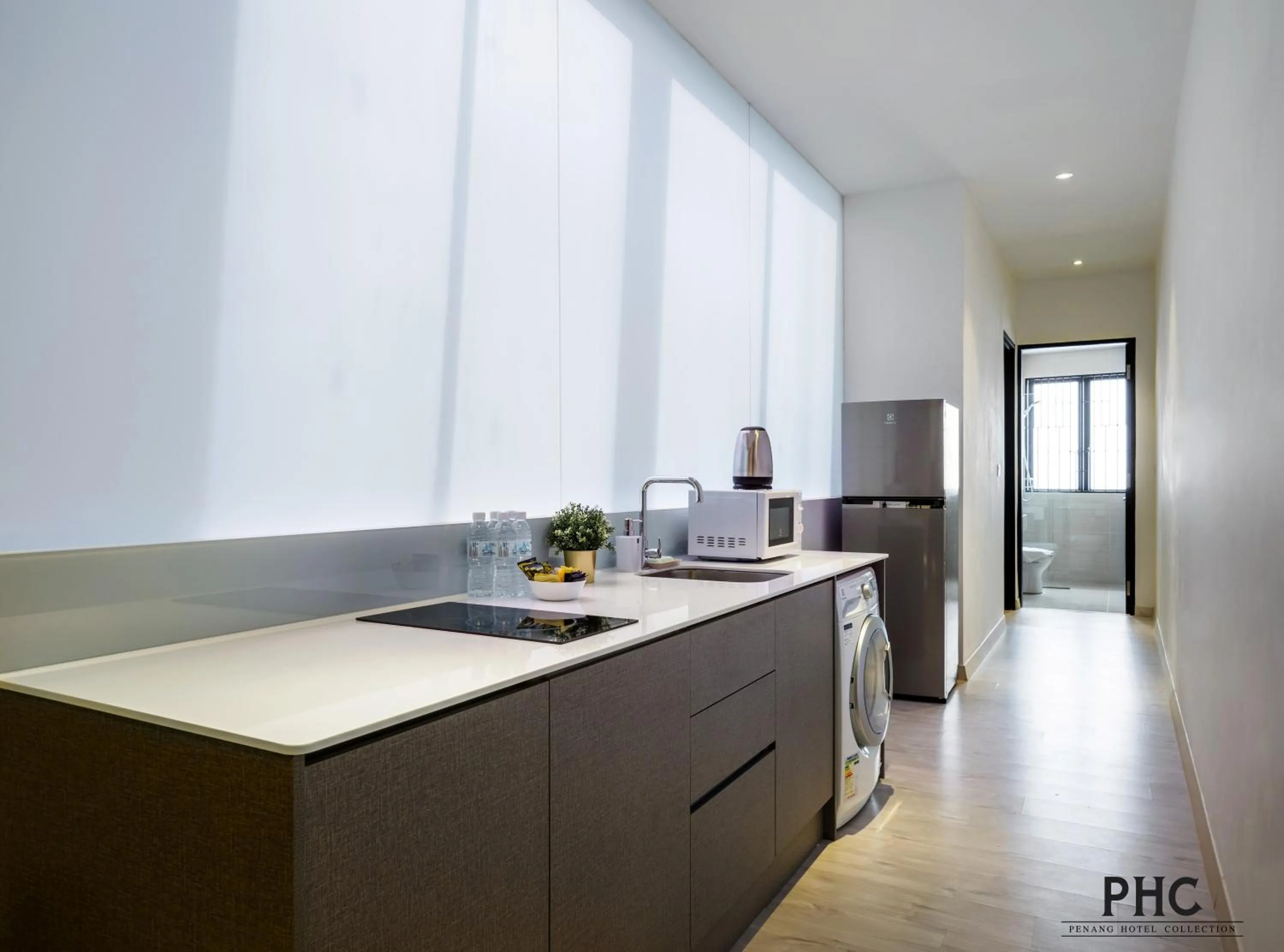 Kitchen or kitchenette in Hutton Suite Hotel Managed by The Ascott Limited
