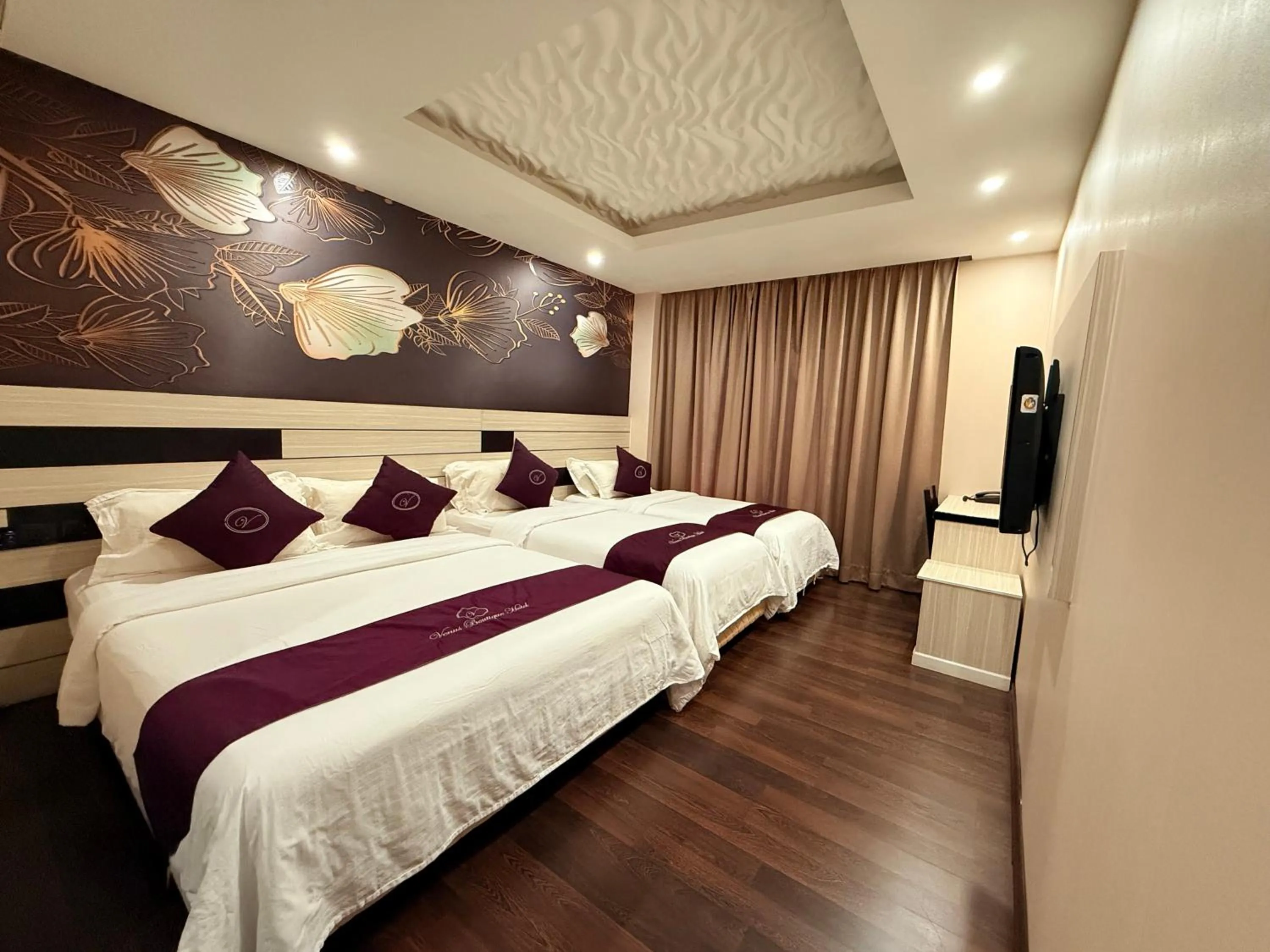 Bed in Venus Boutique Hotel