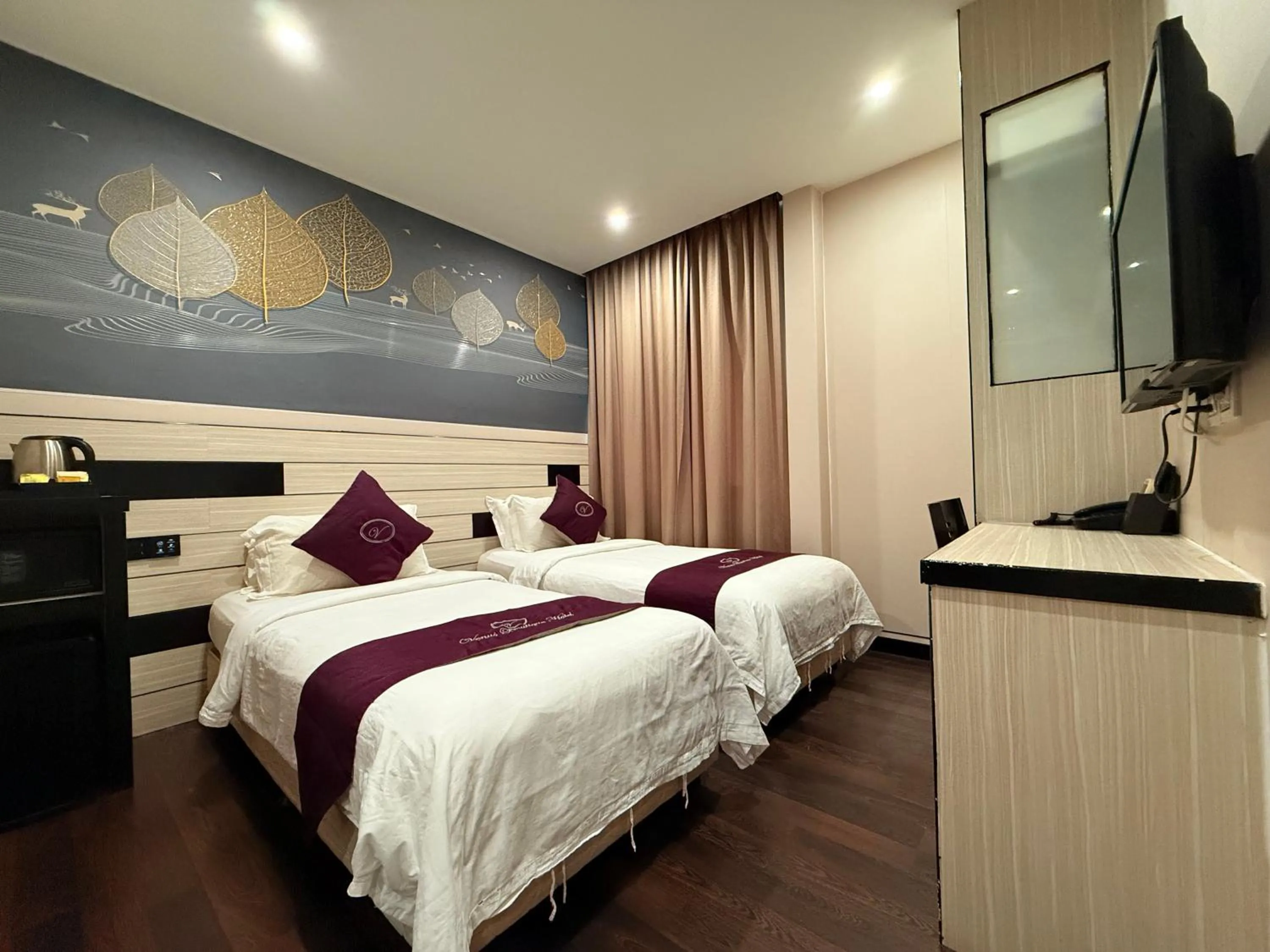 Bed in Venus Boutique Hotel