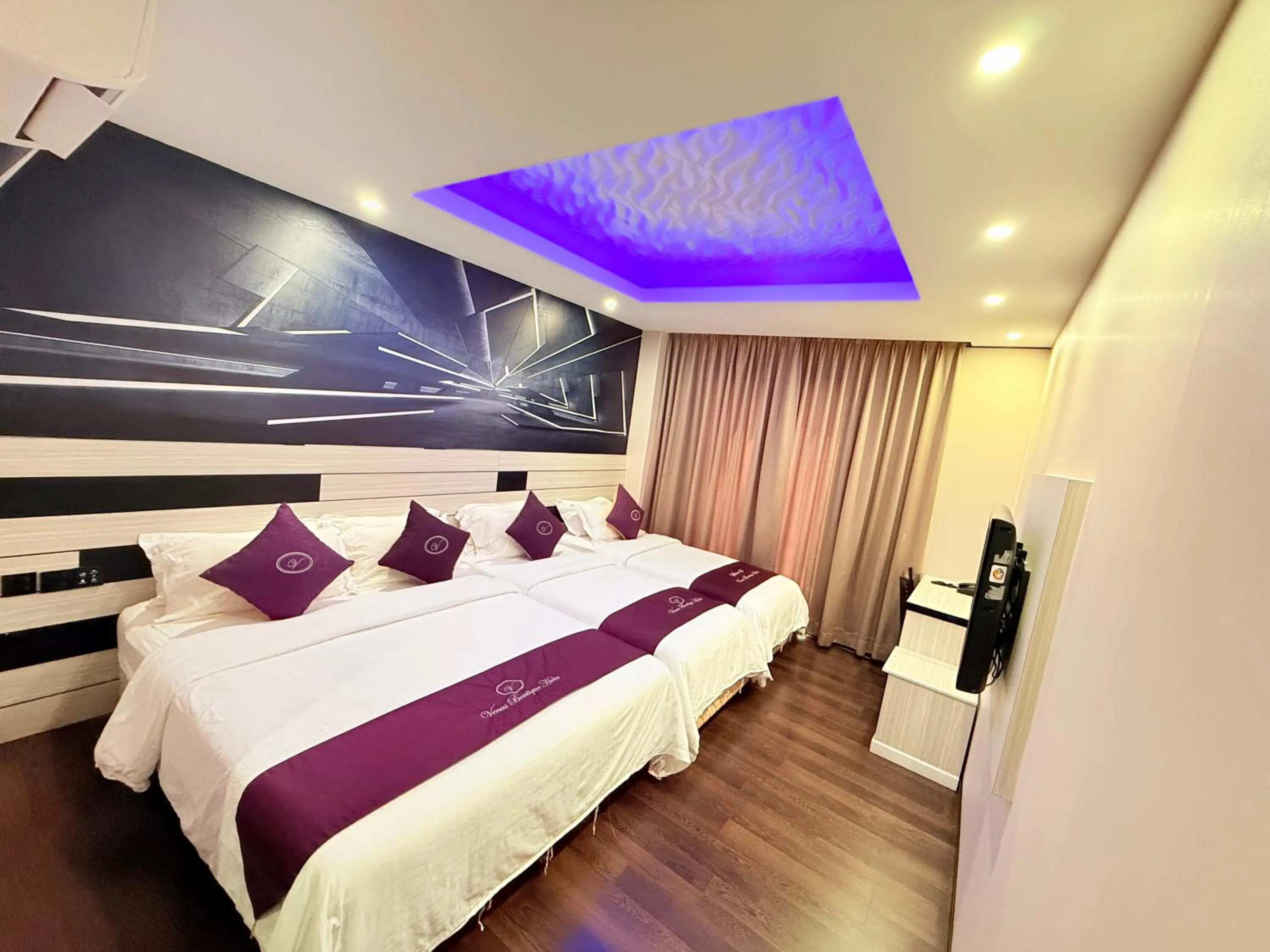 Bed in Venus Boutique Hotel