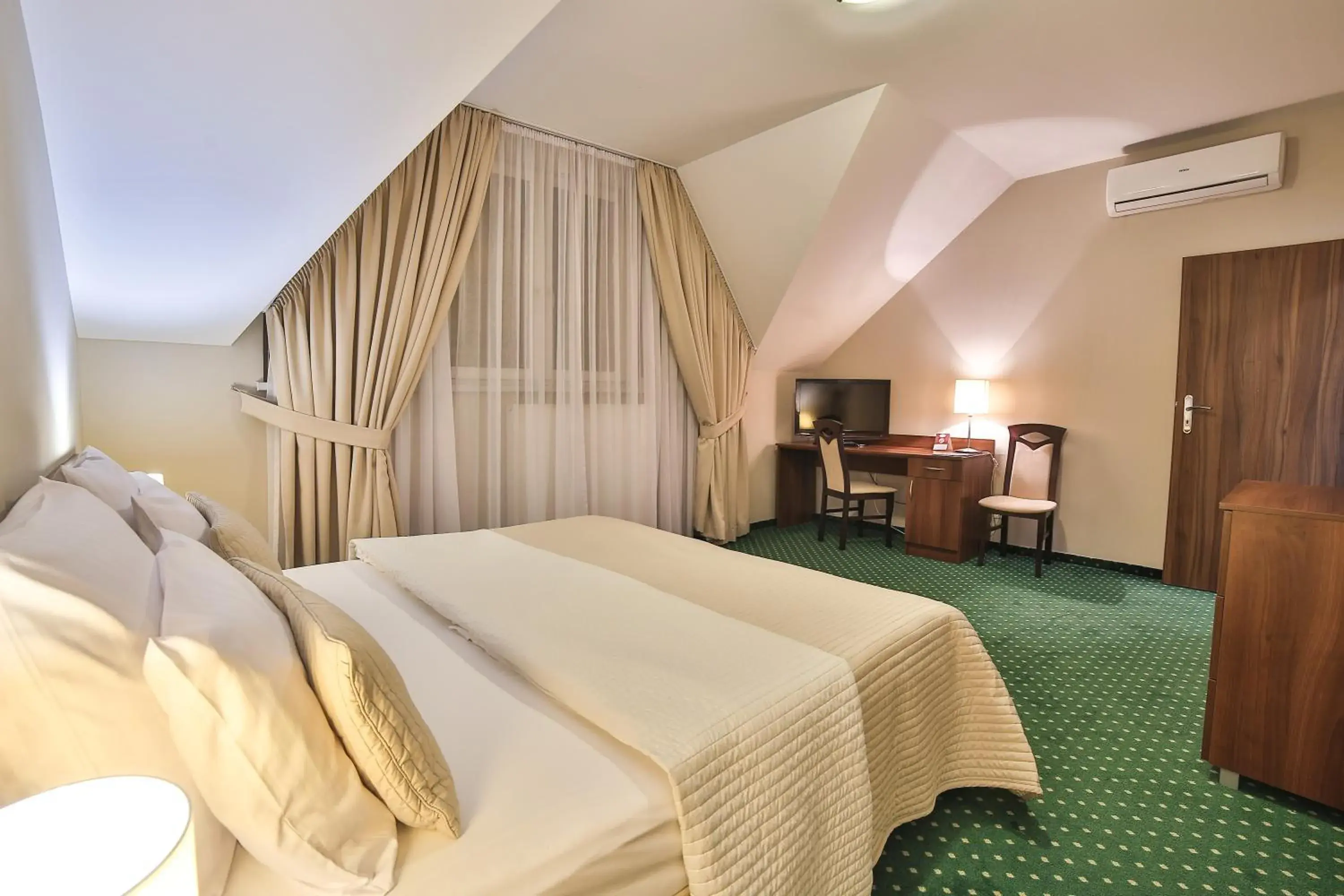 Bed in Hotel Kantoria