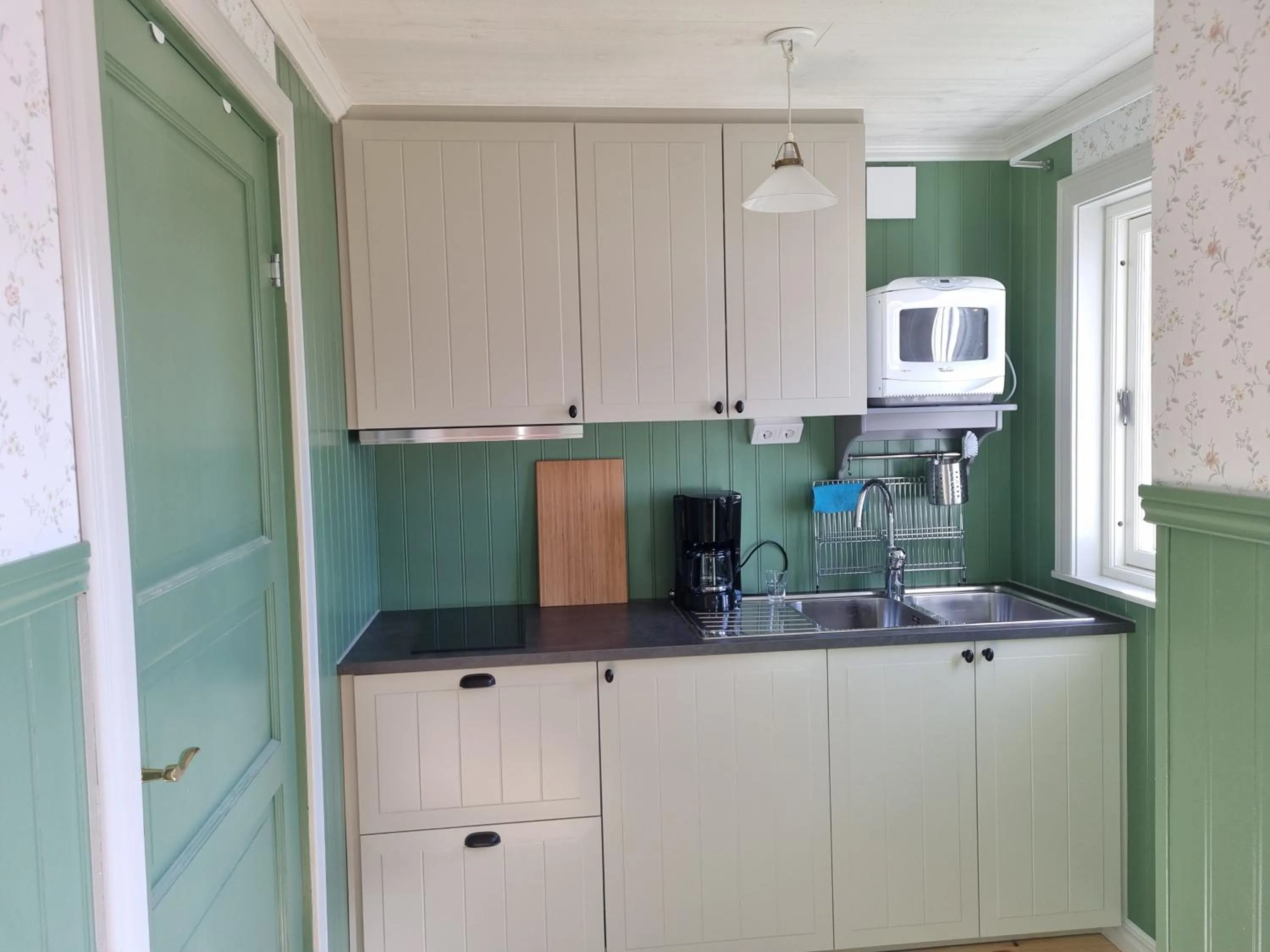 Kitchen or kitchenette in Korskullens Stugor