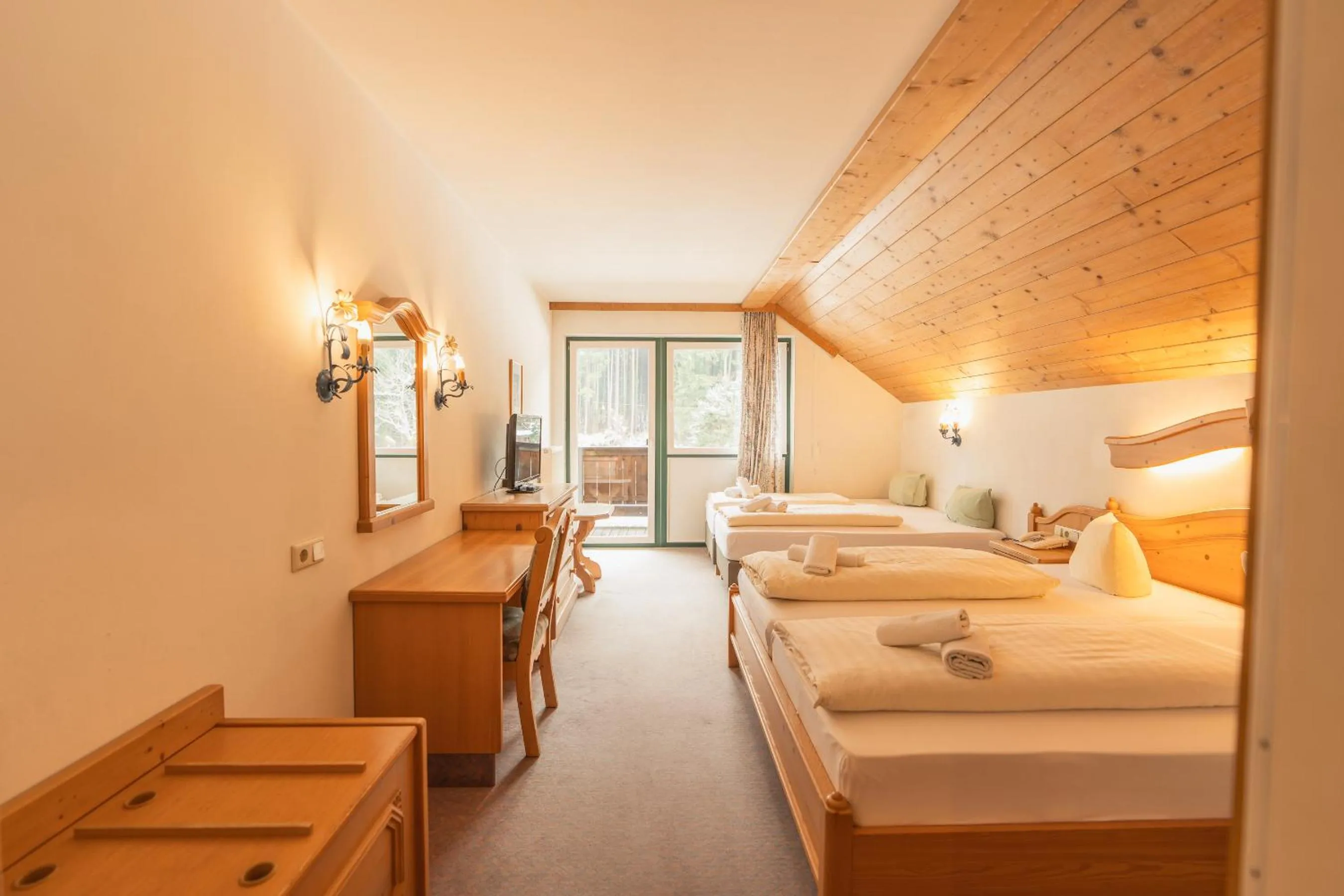 Photo of the whole room, Bed in Hotel Gruberhof Innsbruck Igls B&B