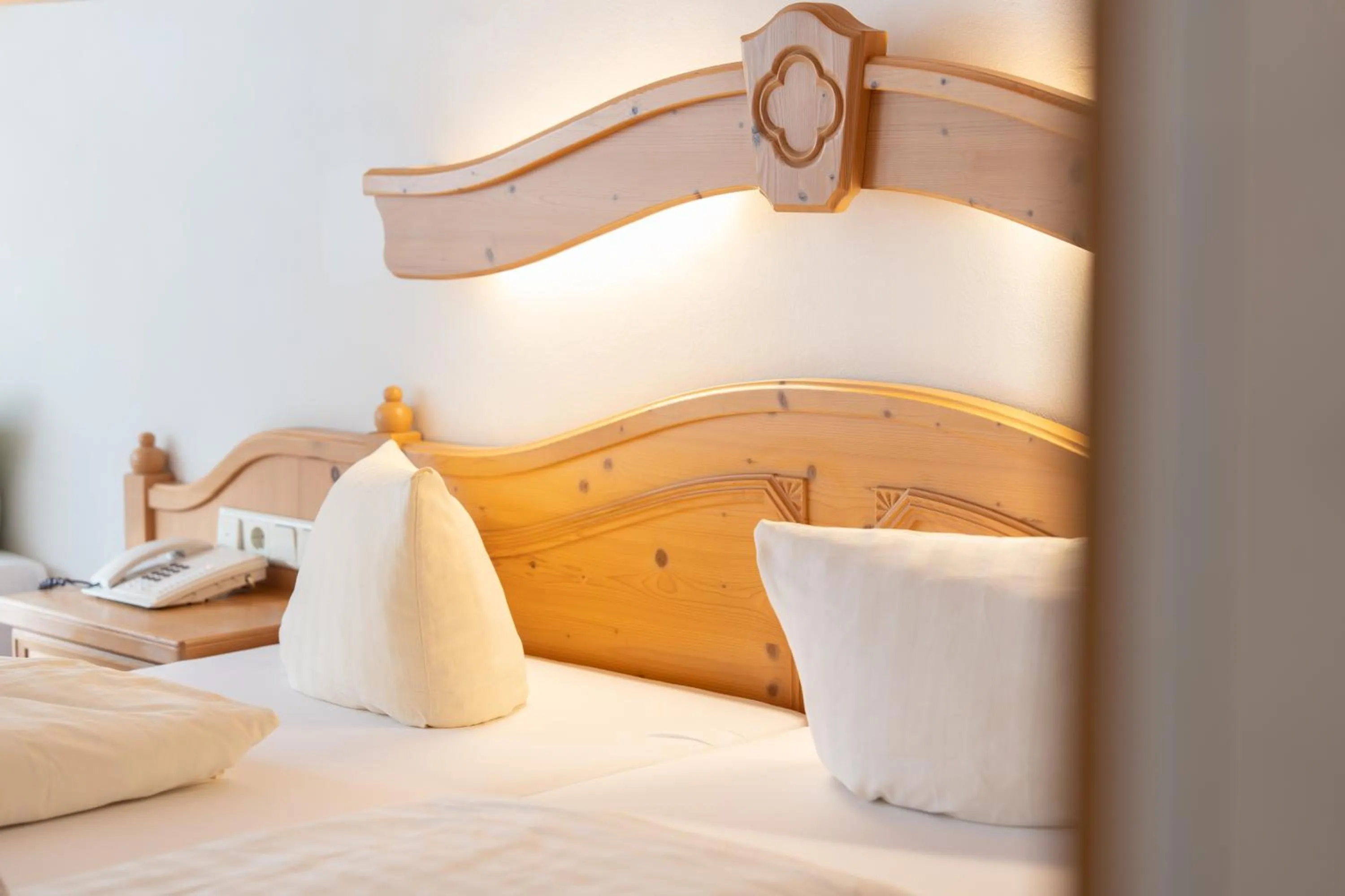 Bed in Hotel Gruberhof Innsbruck Igls B&B