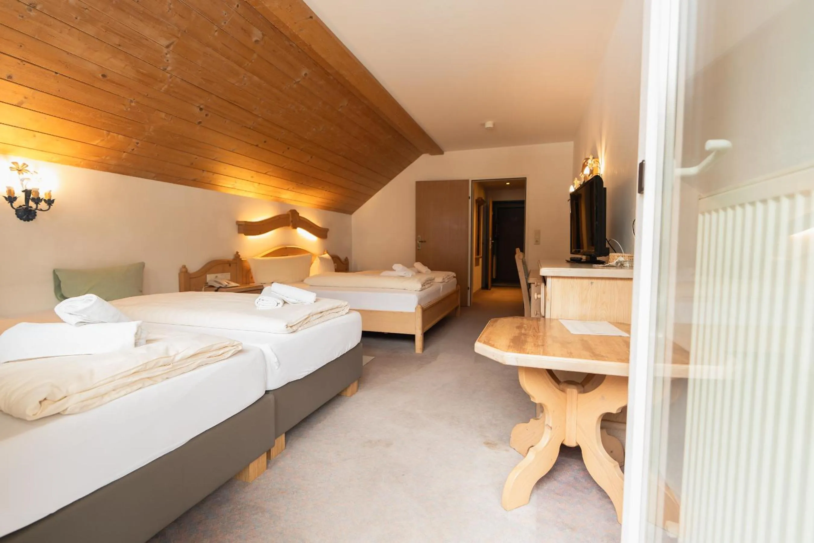 Photo of the whole room, Bed in Hotel Gruberhof Innsbruck Igls B&B