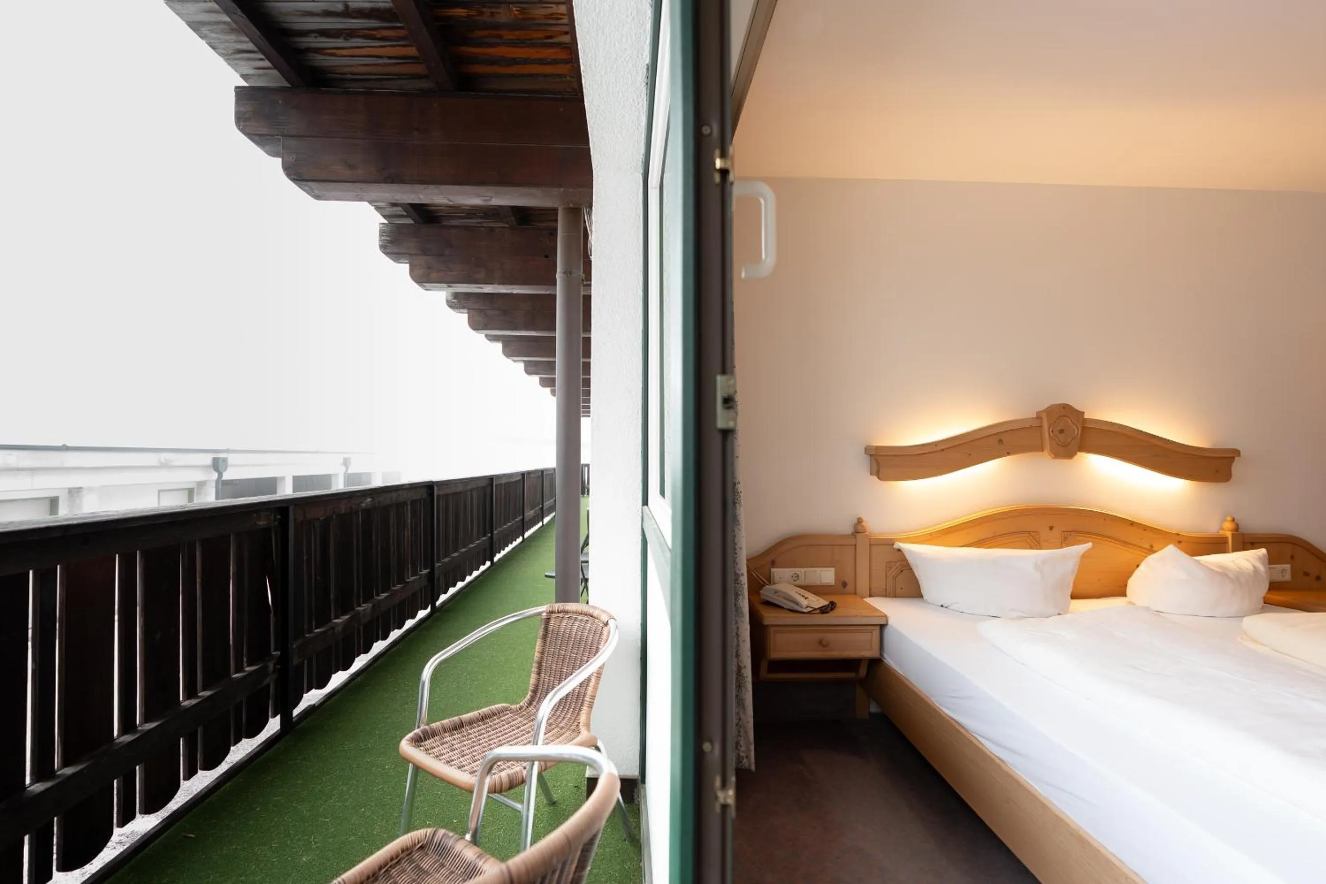 Balcony/Terrace, Bed in Hotel Gruberhof Innsbruck Igls B&B