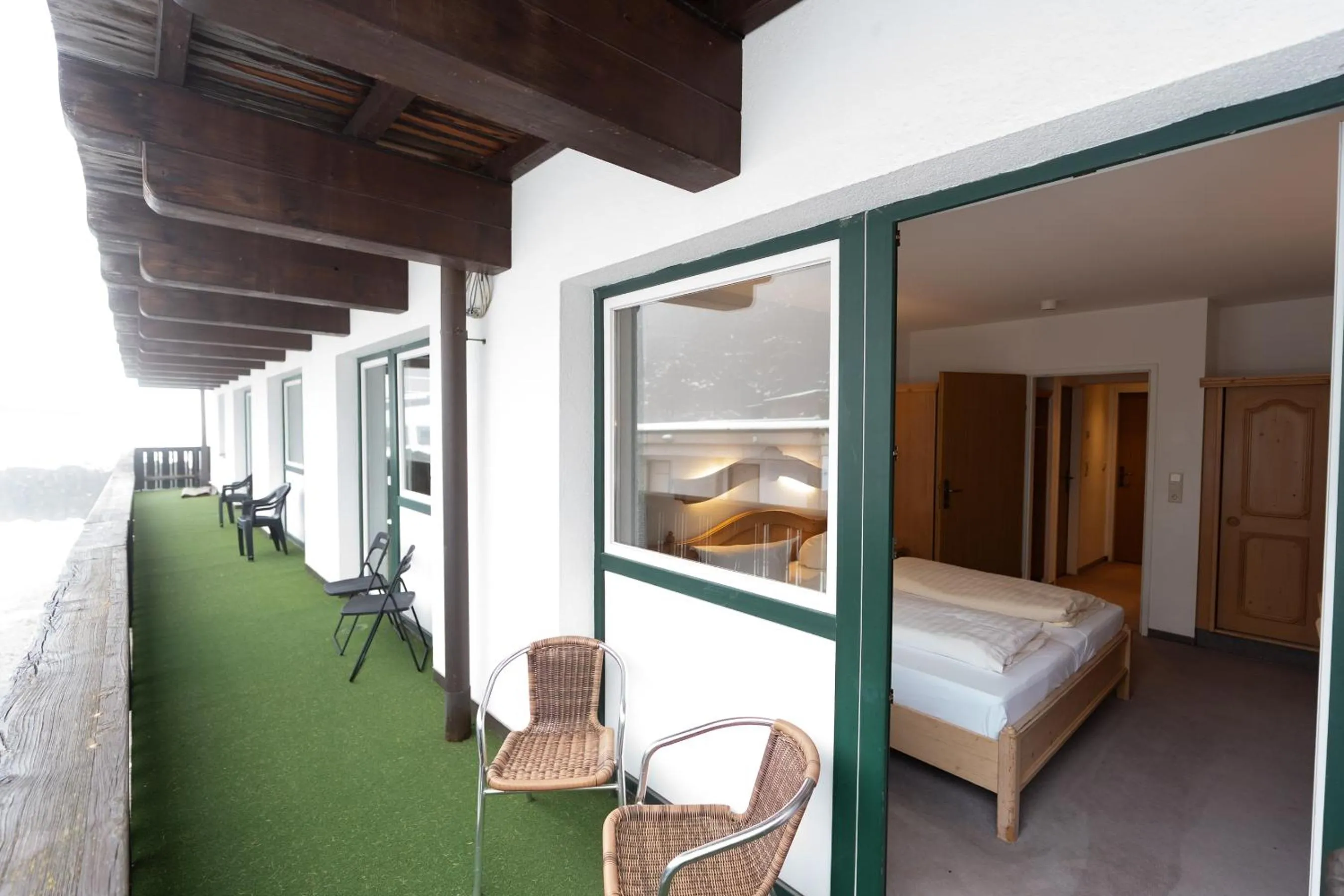 Balcony/Terrace, Bed in Hotel Gruberhof Innsbruck Igls B&B