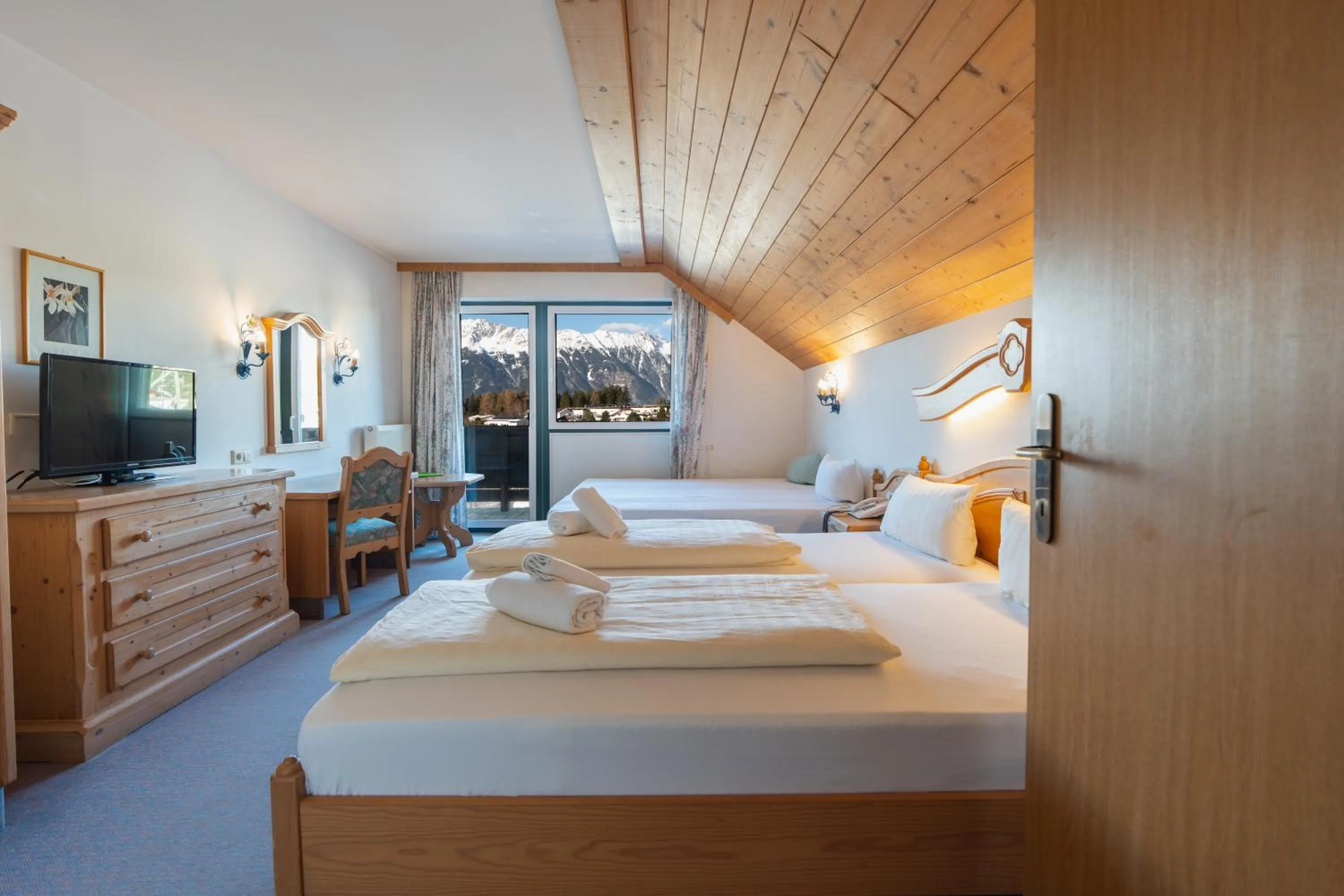 Photo of the whole room, Bed in Hotel Gruberhof Innsbruck Igls B&B