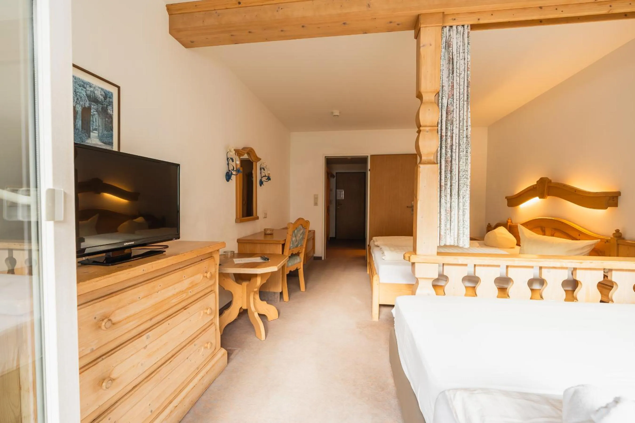 Photo of the whole room, Bed in Hotel Gruberhof Innsbruck Igls B&B