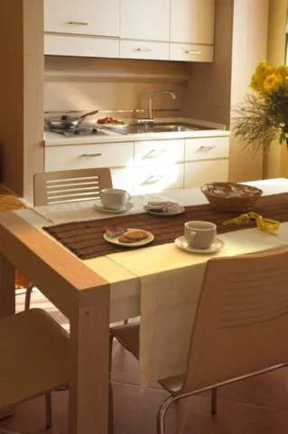 Kitchen or kitchenette in Baiamalva Resort Spa