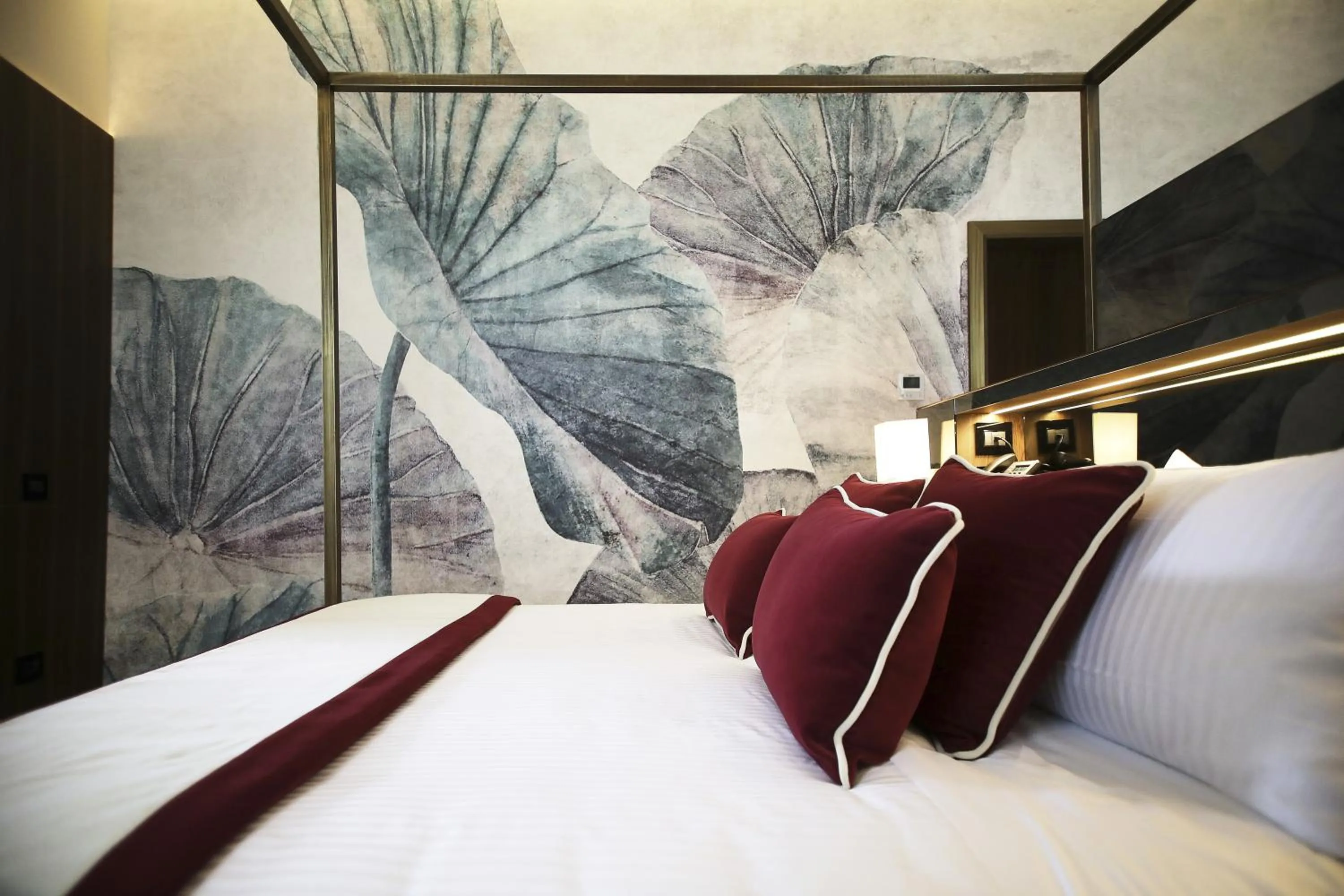 Bed in Messori Suites