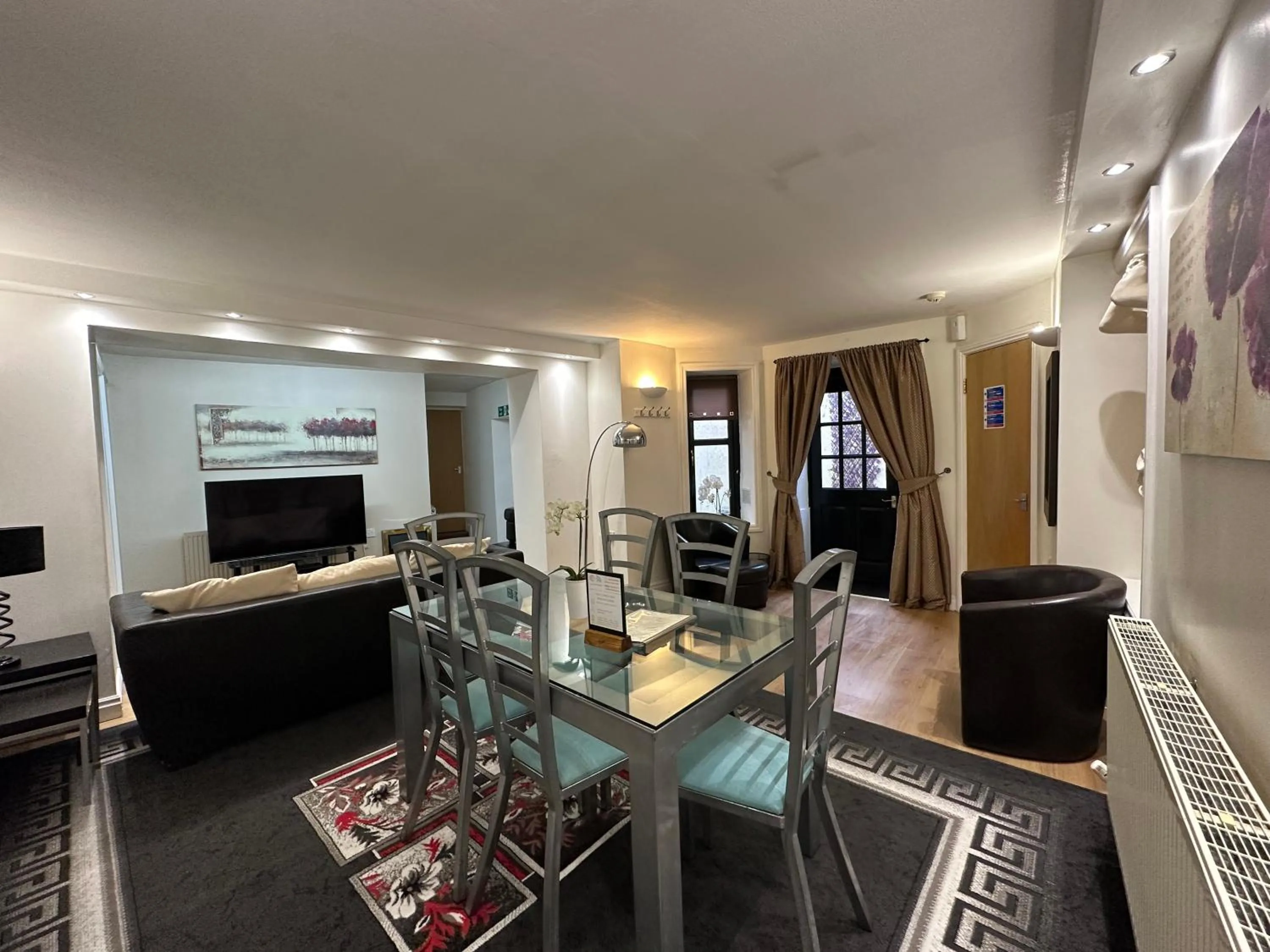 Dining area in The Carlton's Holiday Suites