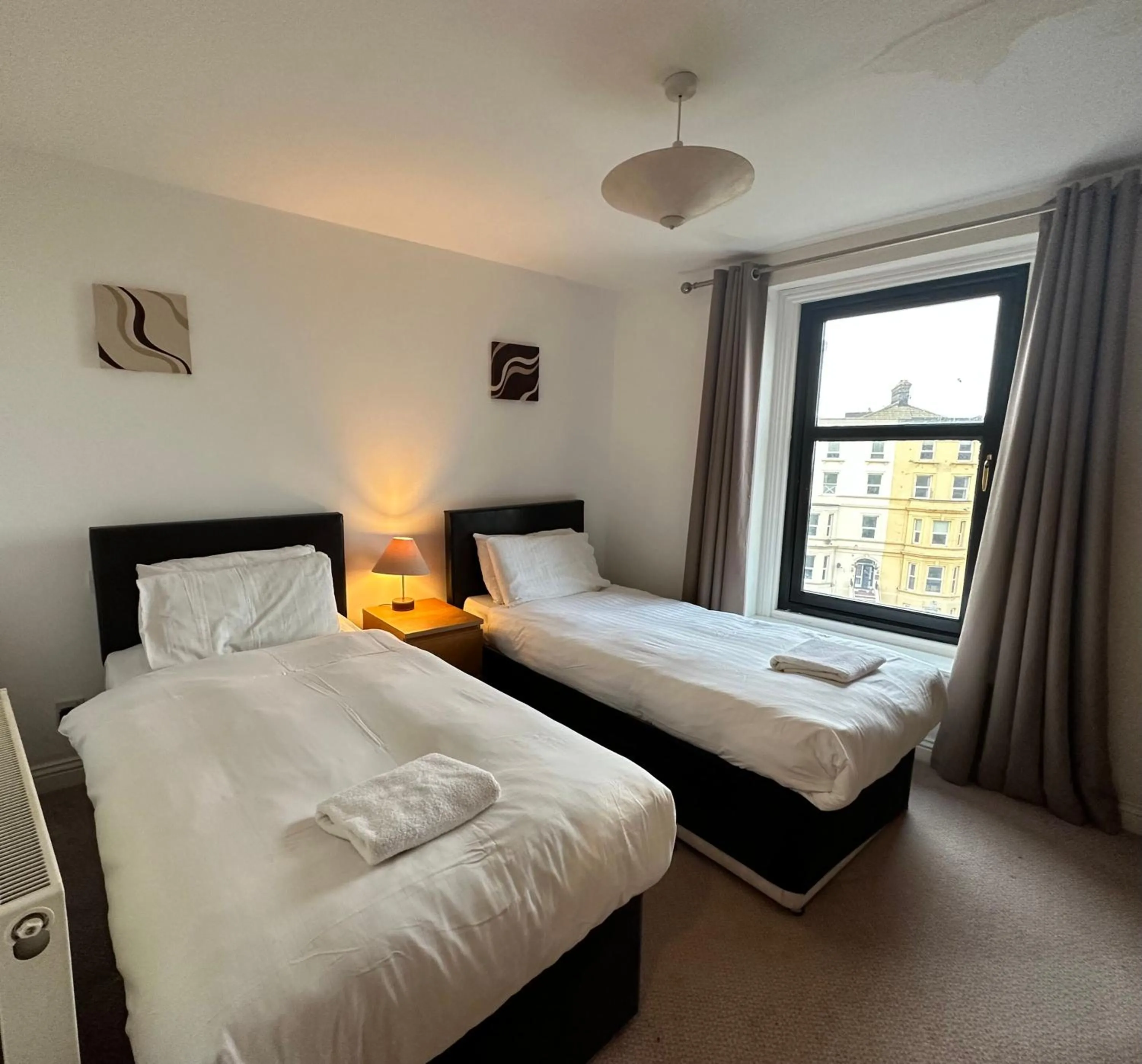 Bedroom, Bed in The Carlton's Holiday Suites