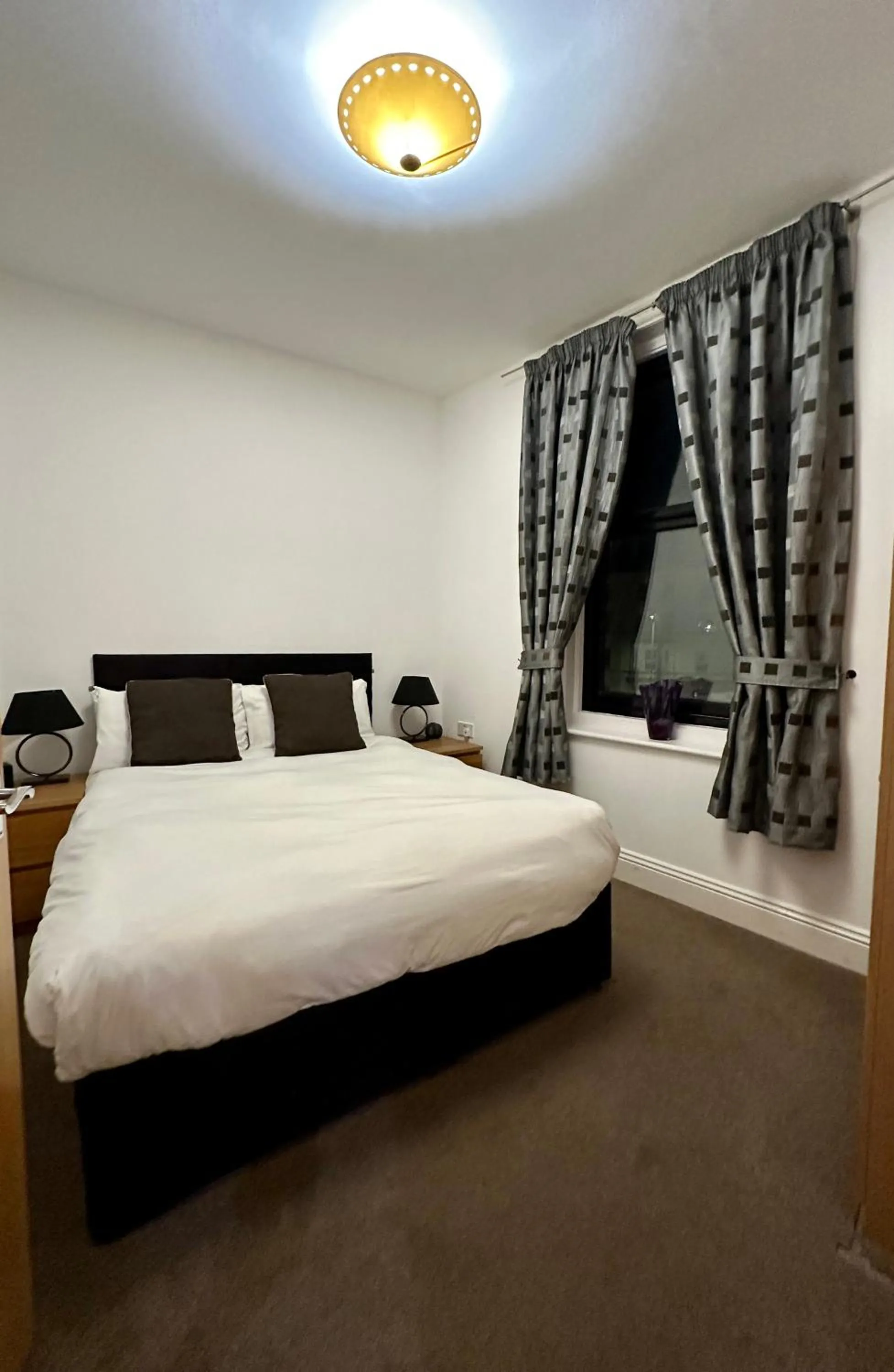 Bedroom, Bed in The Carlton's Holiday Suites