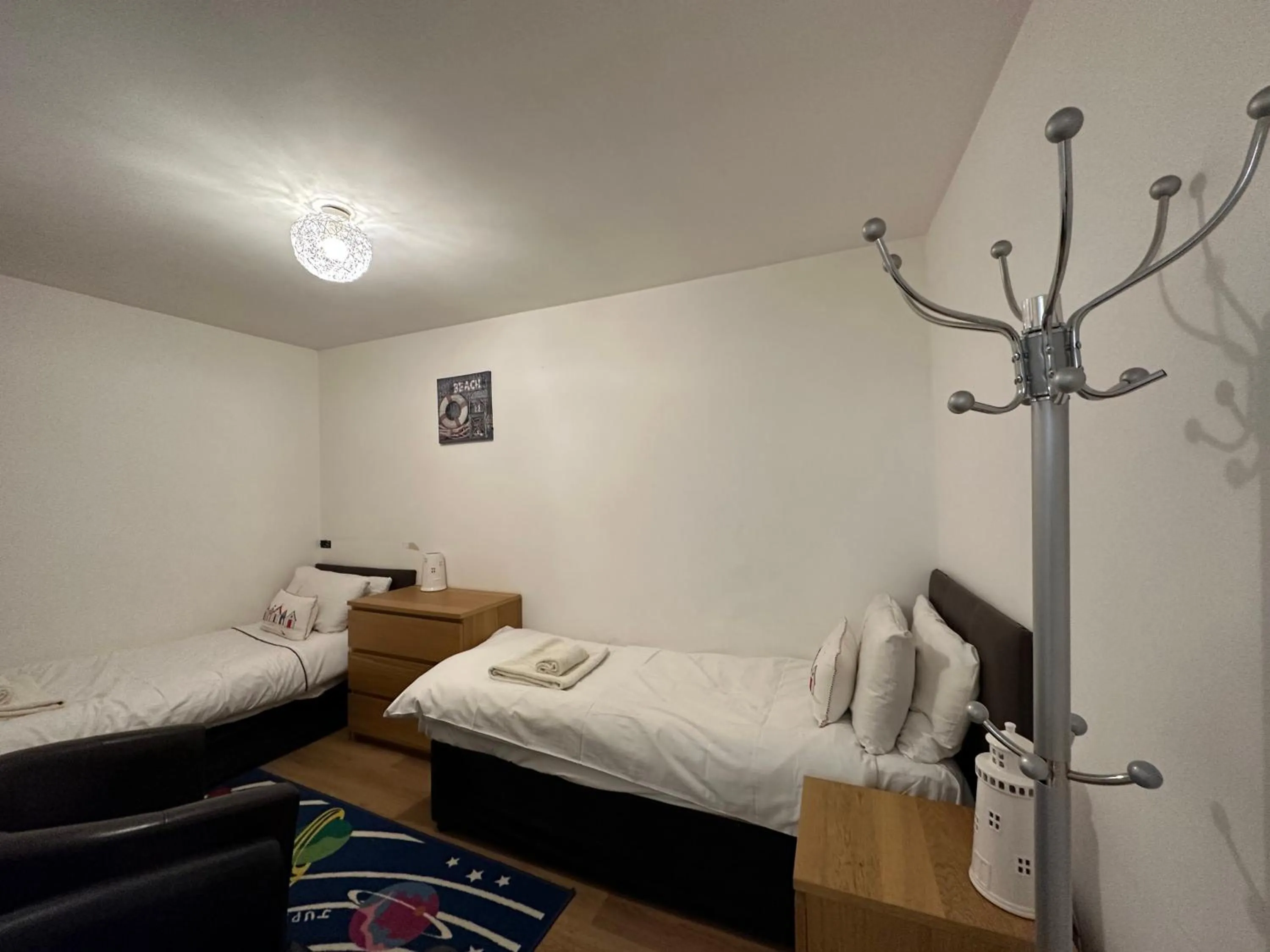 Bedroom, Bed in The Carlton's Holiday Suites