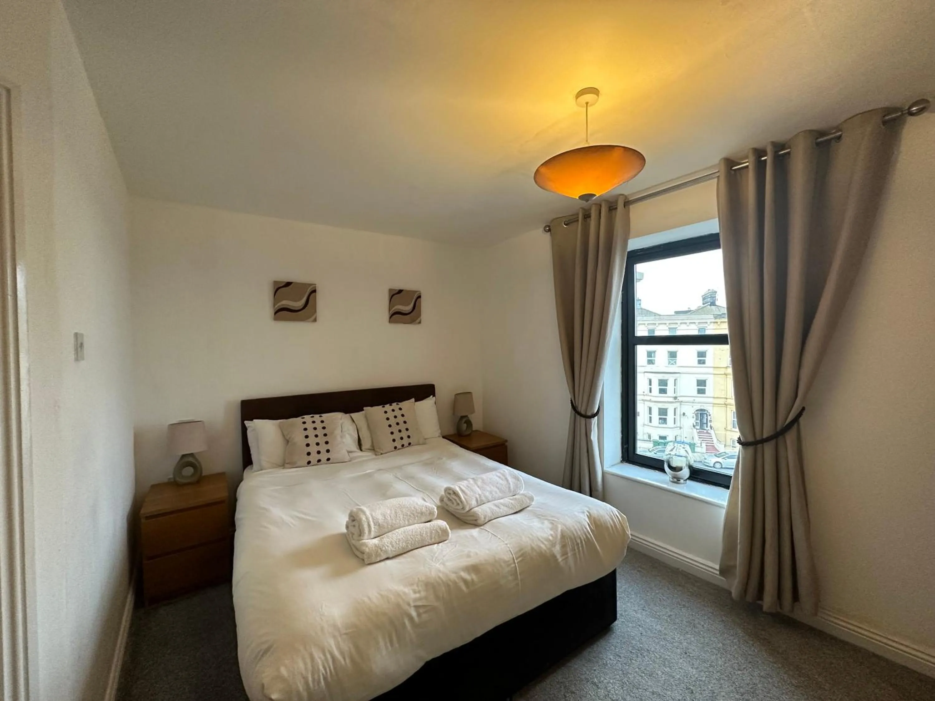 Bedroom, Bed in The Carlton's Holiday Suites