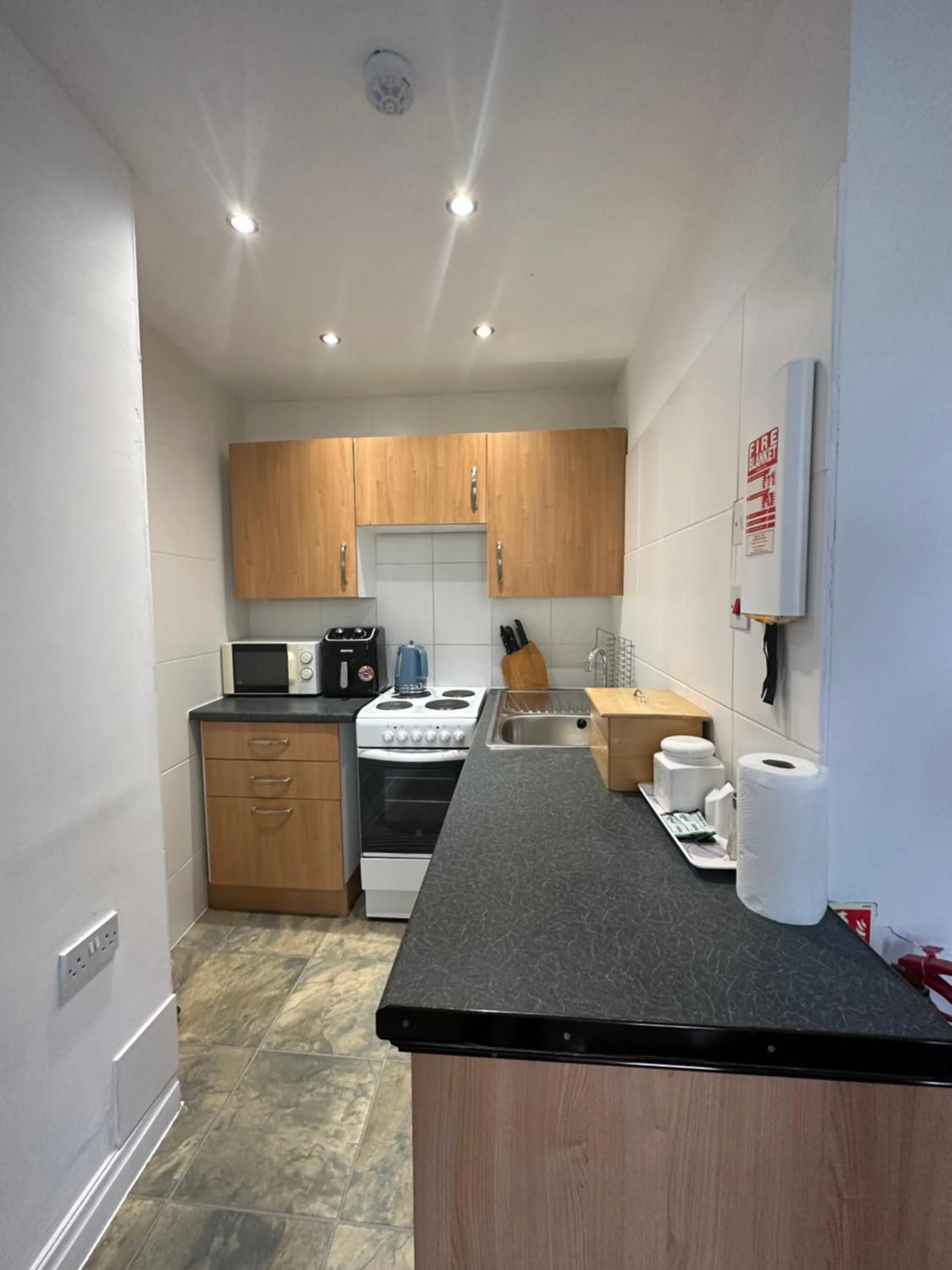 Kitchen or kitchenette in The Carlton's Holiday Suites
