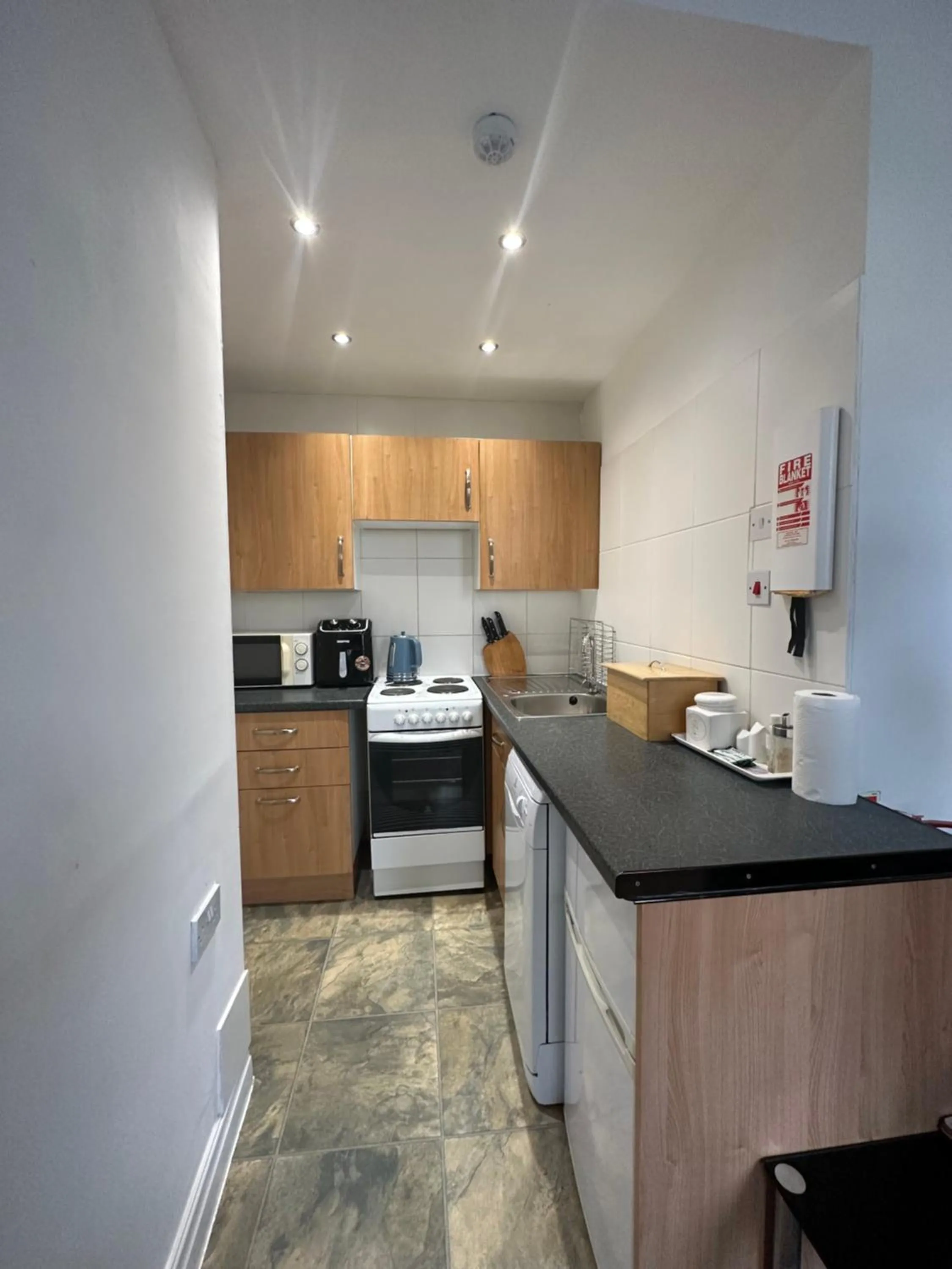 Kitchen or kitchenette in The Carlton's Holiday Suites