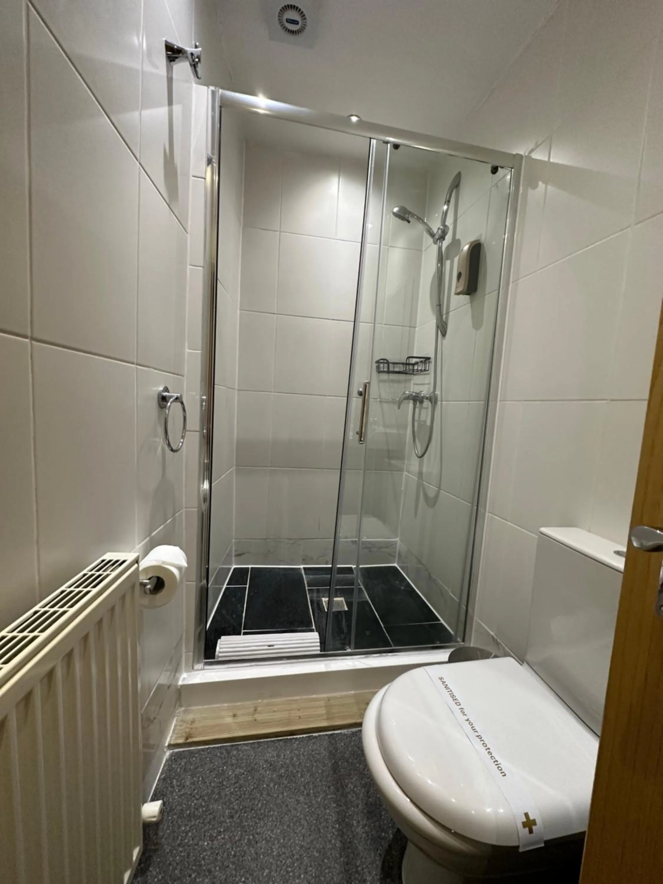 Shower in The Carlton's Holiday Suites