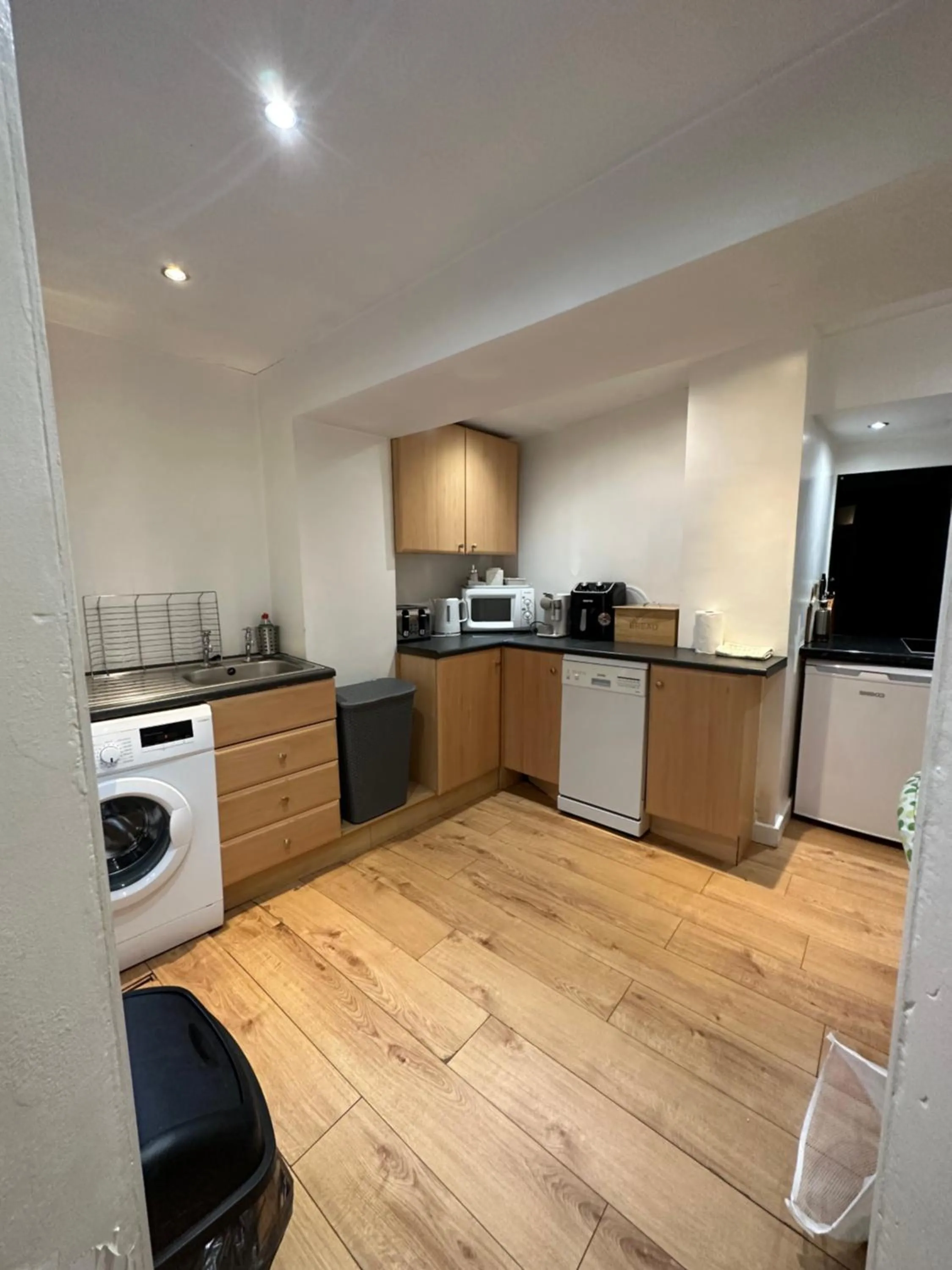 Kitchen or kitchenette in The Carlton's Holiday Suites