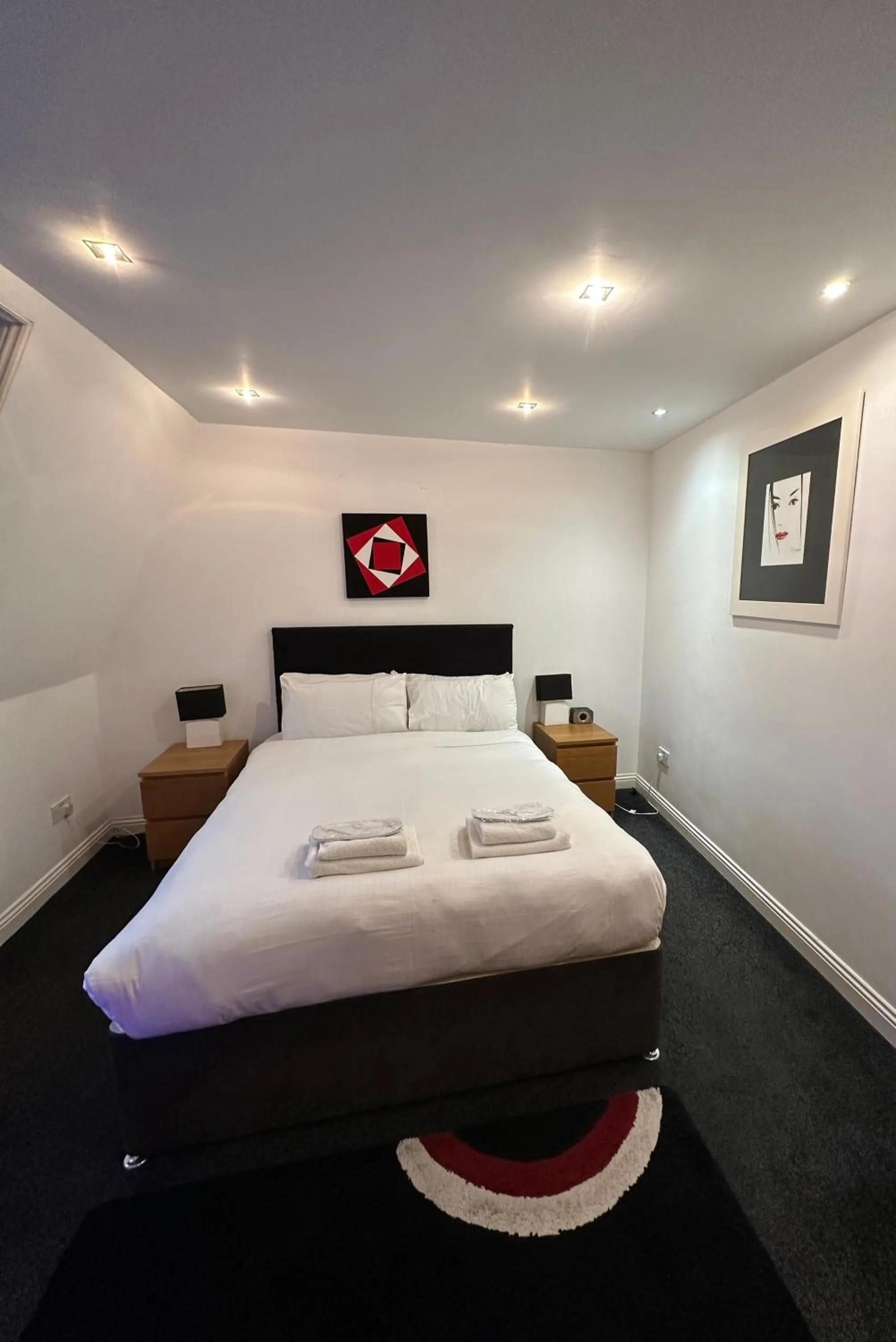 Bedroom, Bed in The Carlton's Holiday Suites