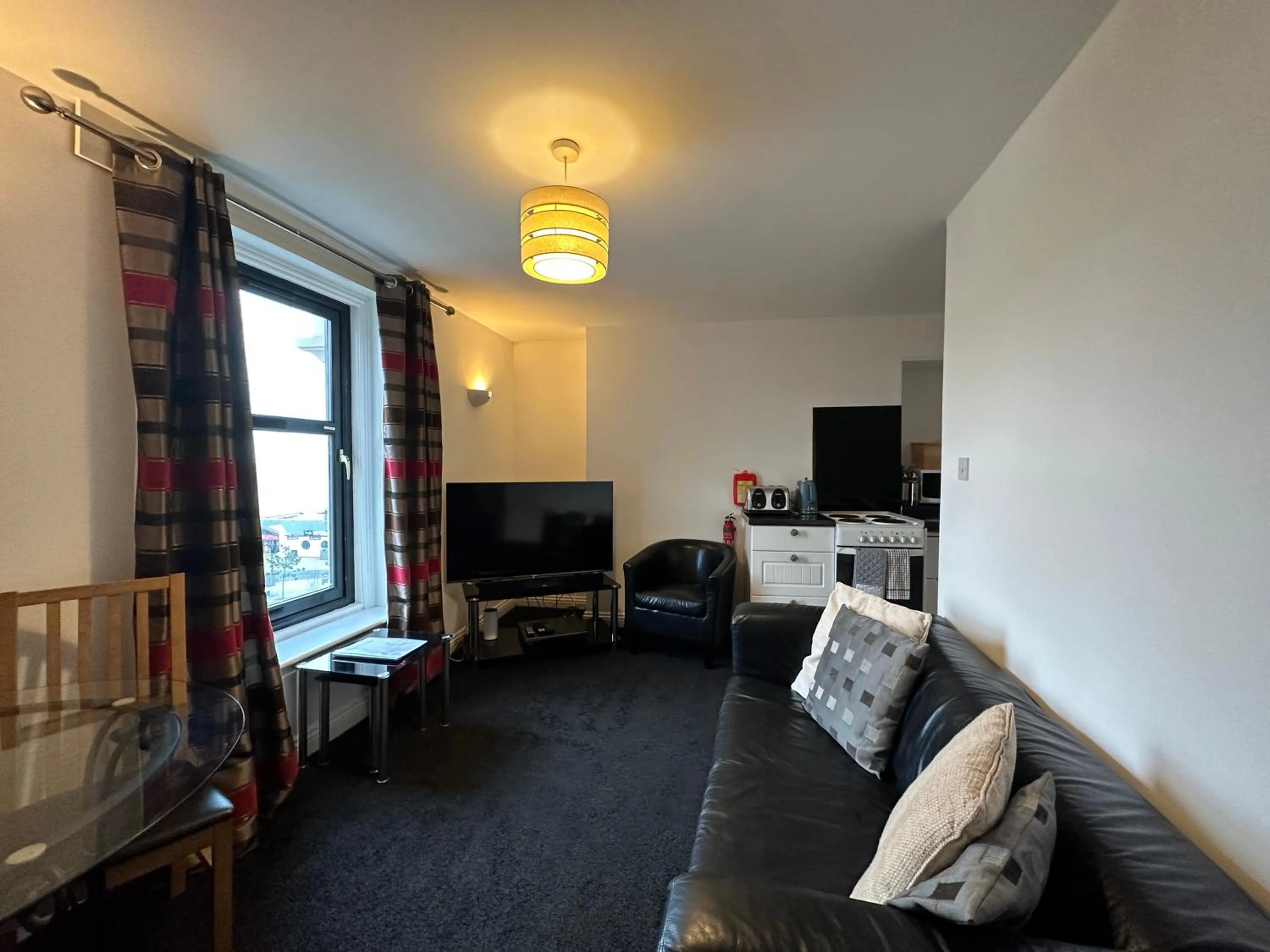 Living room in The Carlton's Holiday Suites